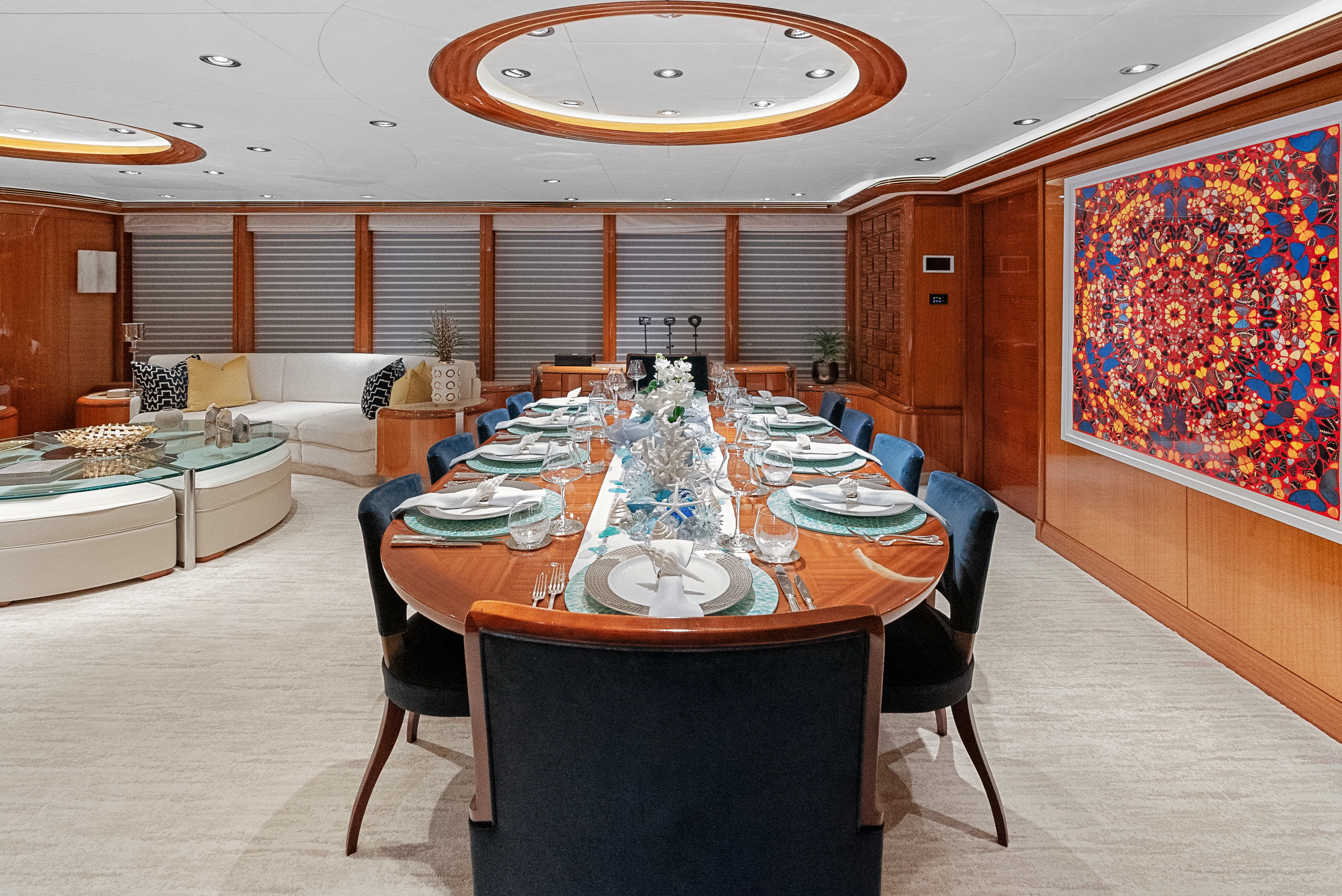 a dining room with a table aboard AMICA MEA Yacht for Sale
