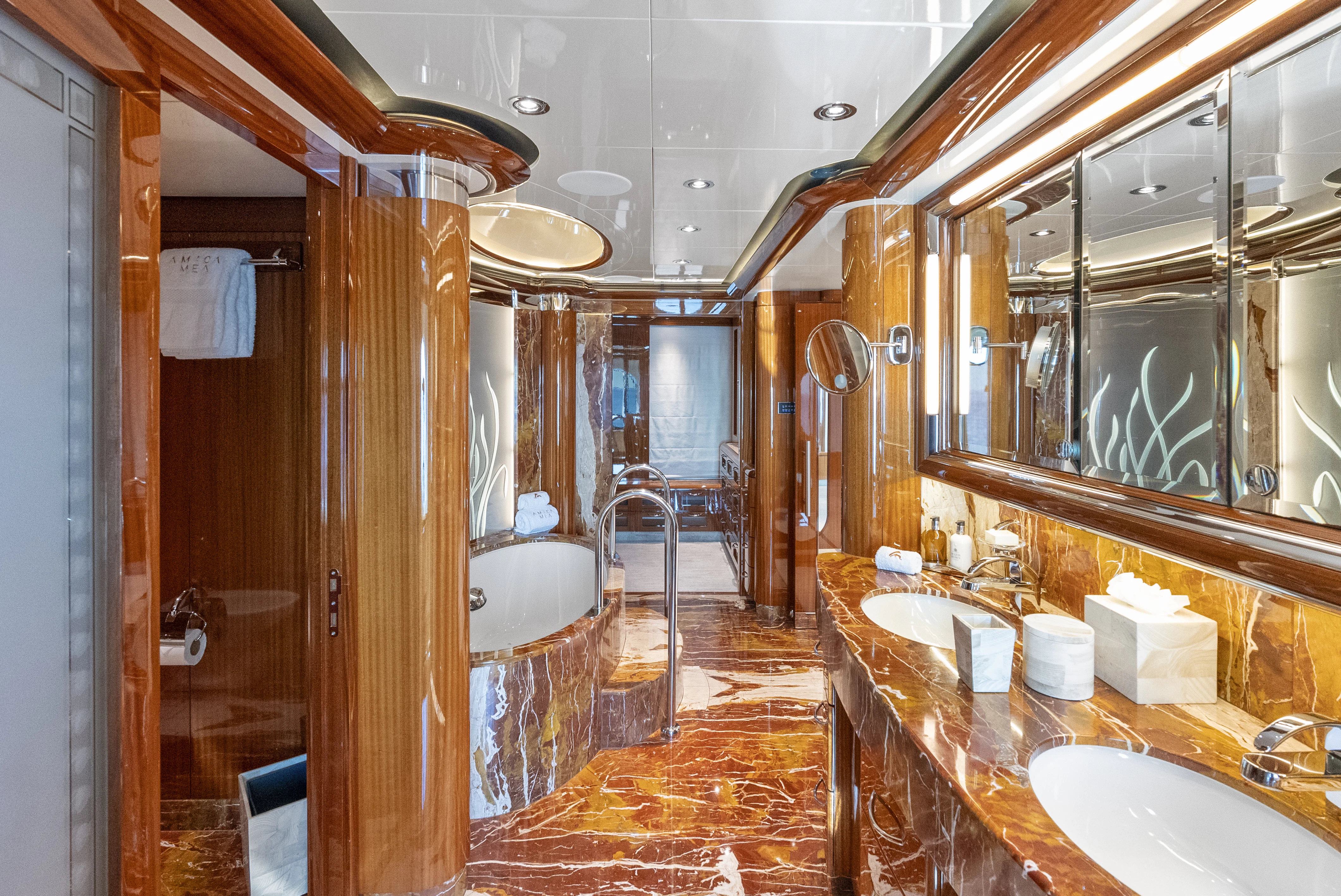 a bathroom with a large mirror aboard AMICA MEA Yacht for Sale