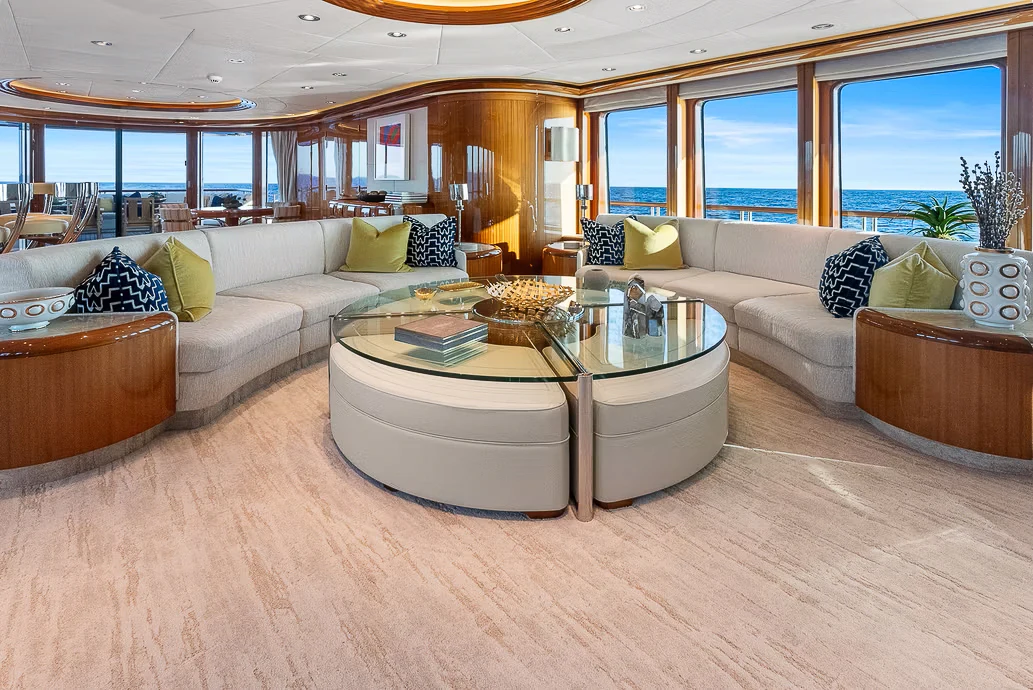 a living room with a large window aboard AMICA MEA Yacht for Sale