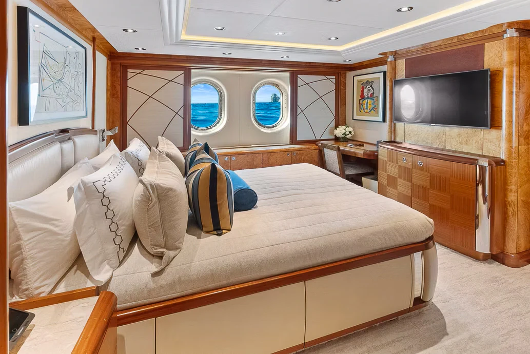 a bed with pillows and pillows aboard AMICA MEA Yacht for Sale