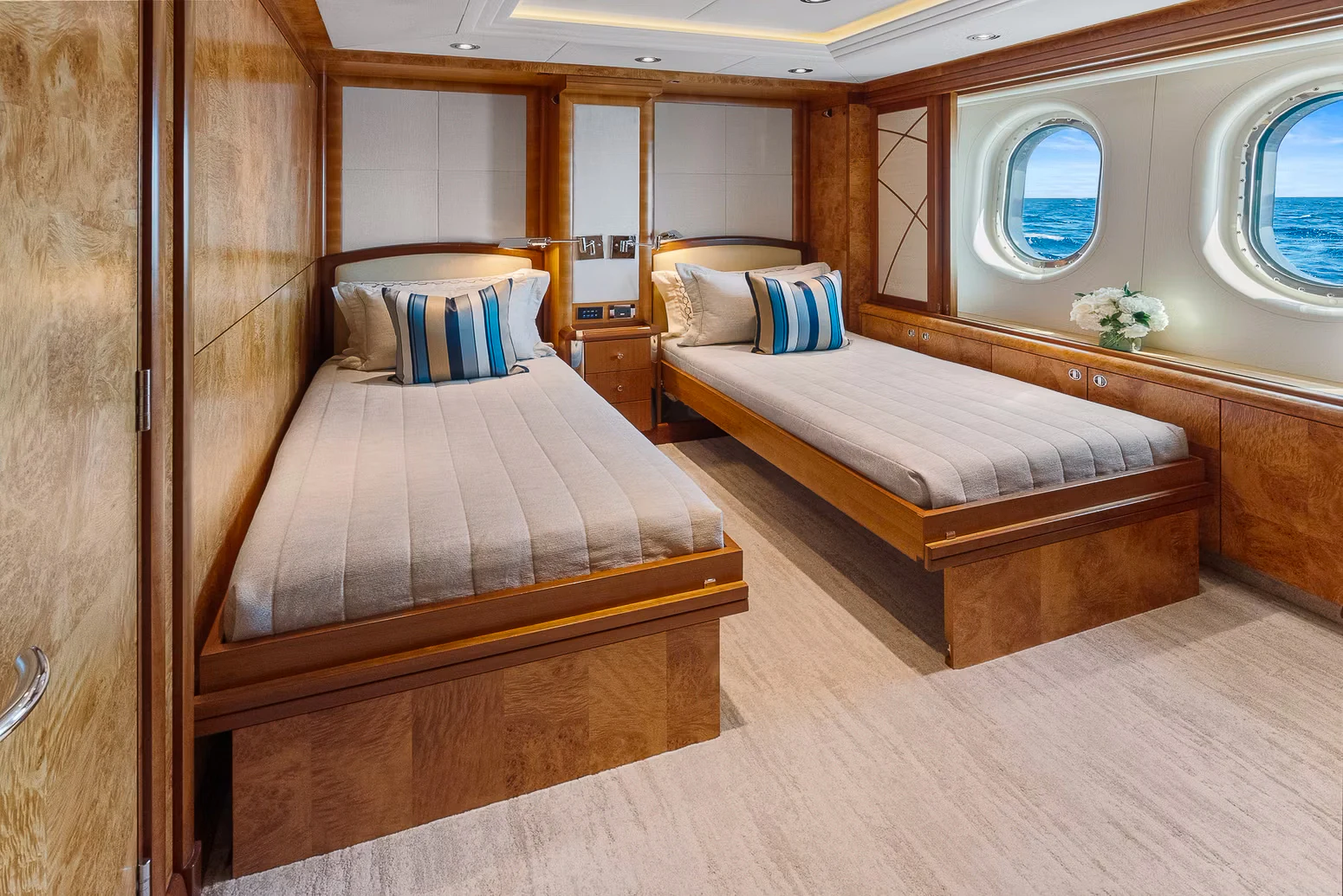 a room with two beds aboard AMICA MEA Yacht for Sale