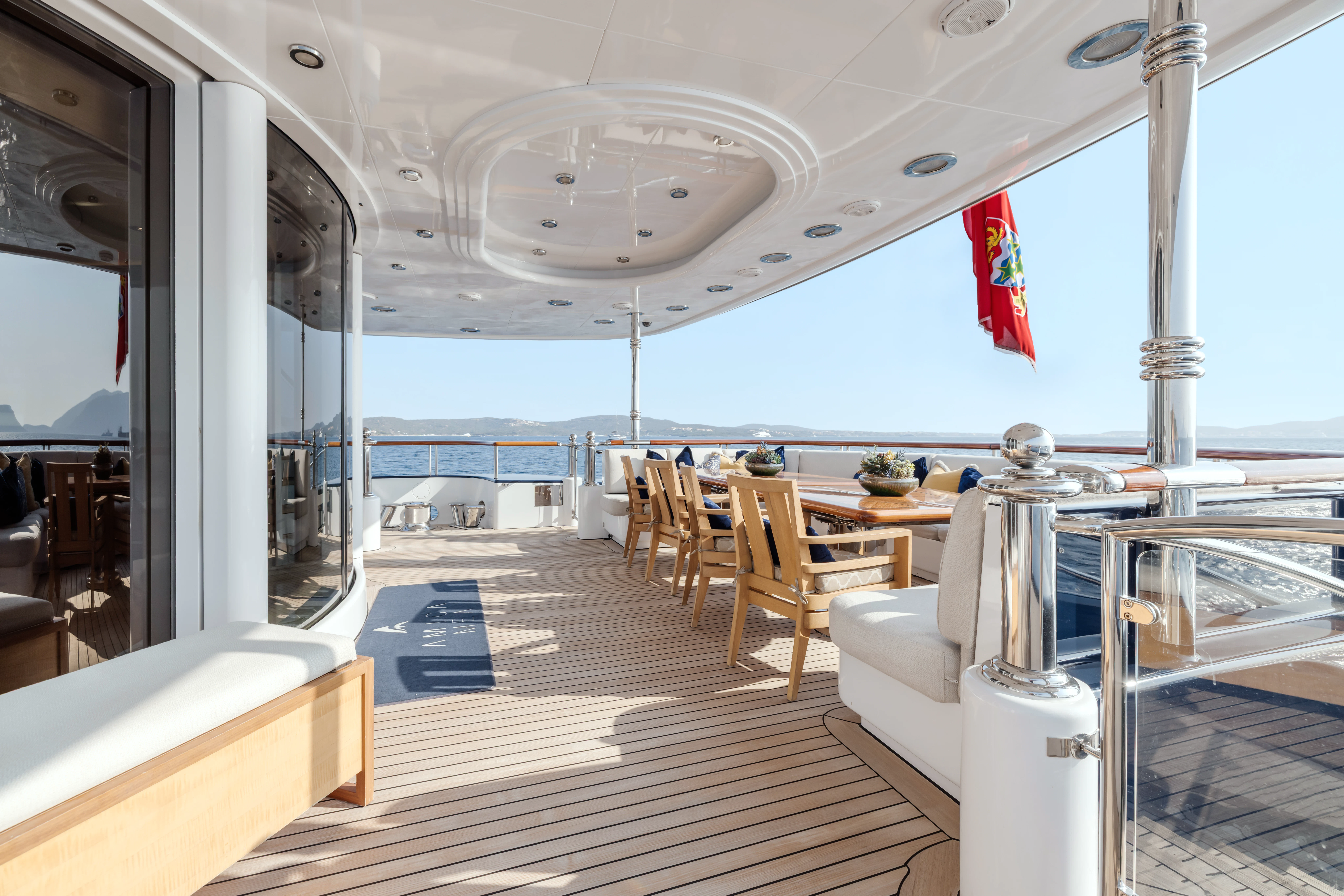 inside of a building with tables and chairs aboard AMICA MEA Yacht for Sale