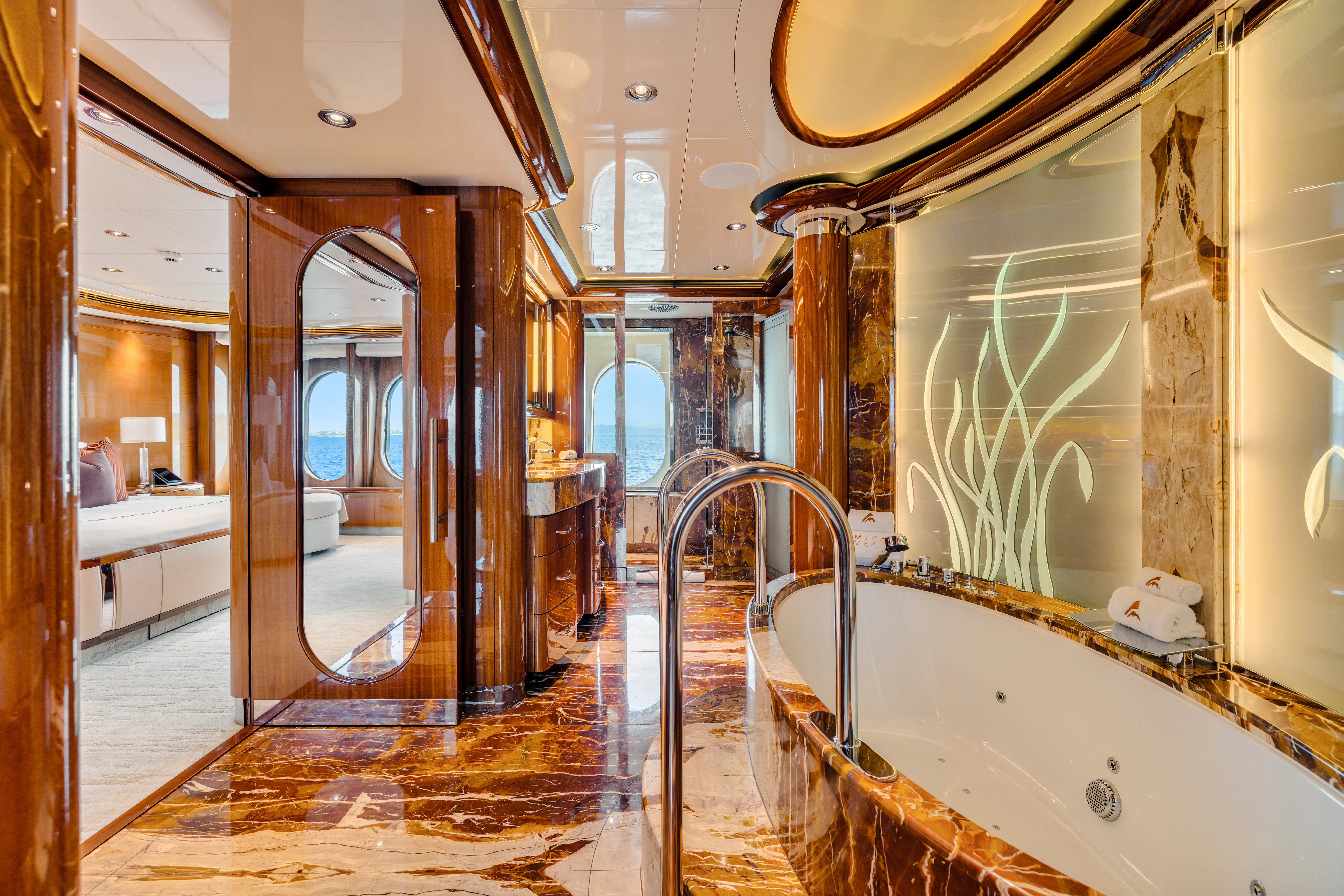 a bathroom with a large bathtub aboard AMICA MEA Yacht for Sale