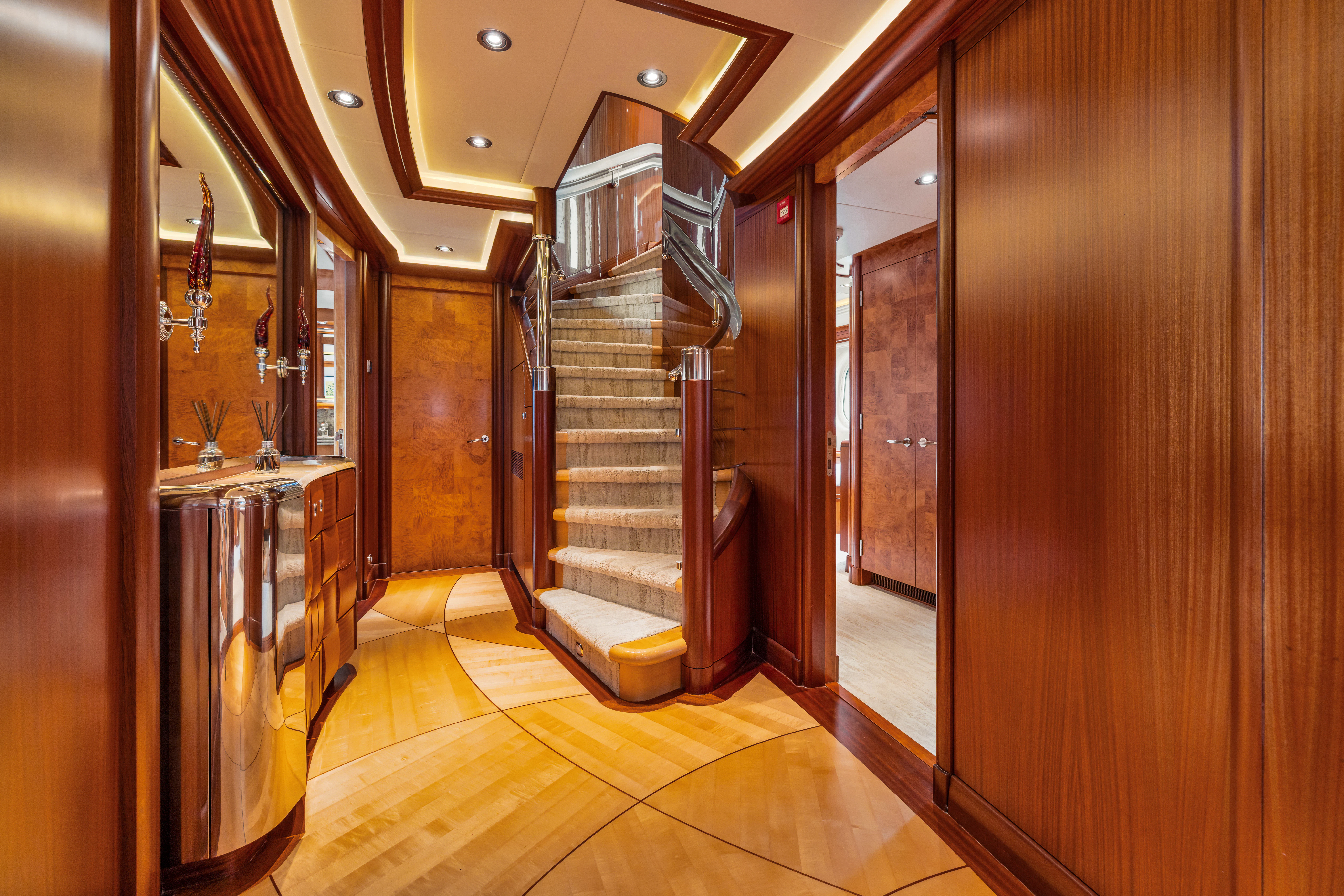 a hallway with wood cabinets aboard AMICA MEA Yacht for Sale