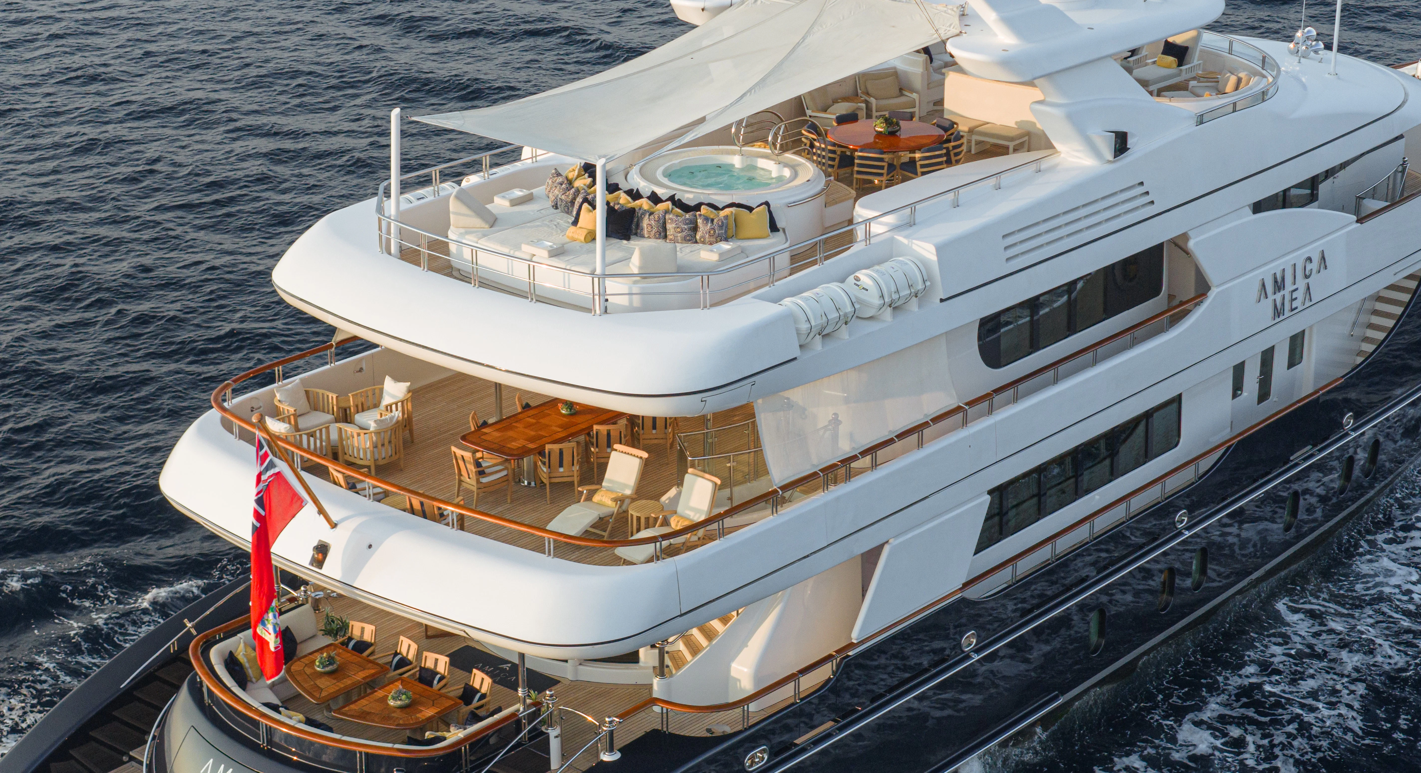 a large ship on the water aboard AMICA MEA Yacht for Sale