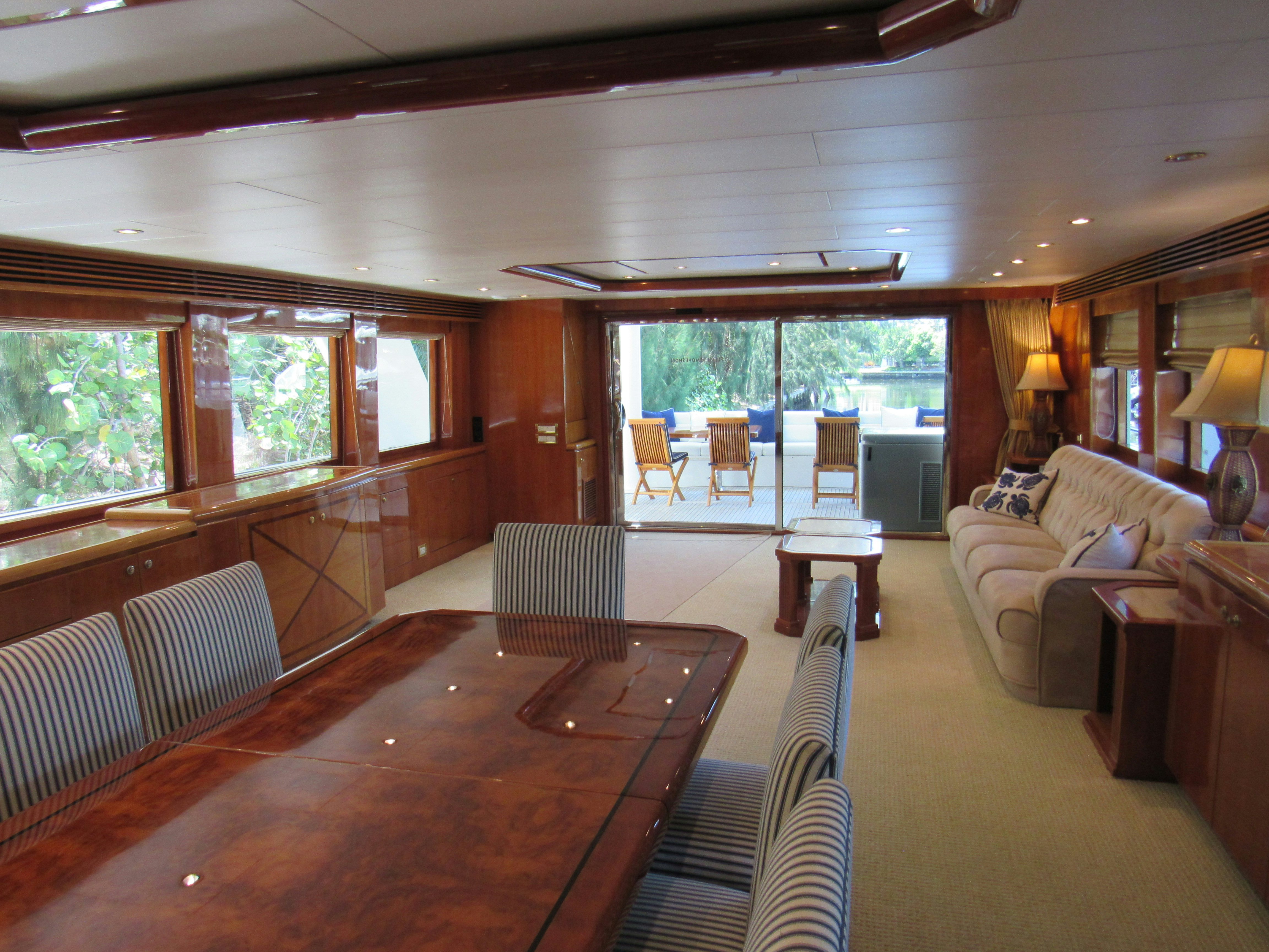 a living room with a large window aboard SANCTUARY Yacht for Sale