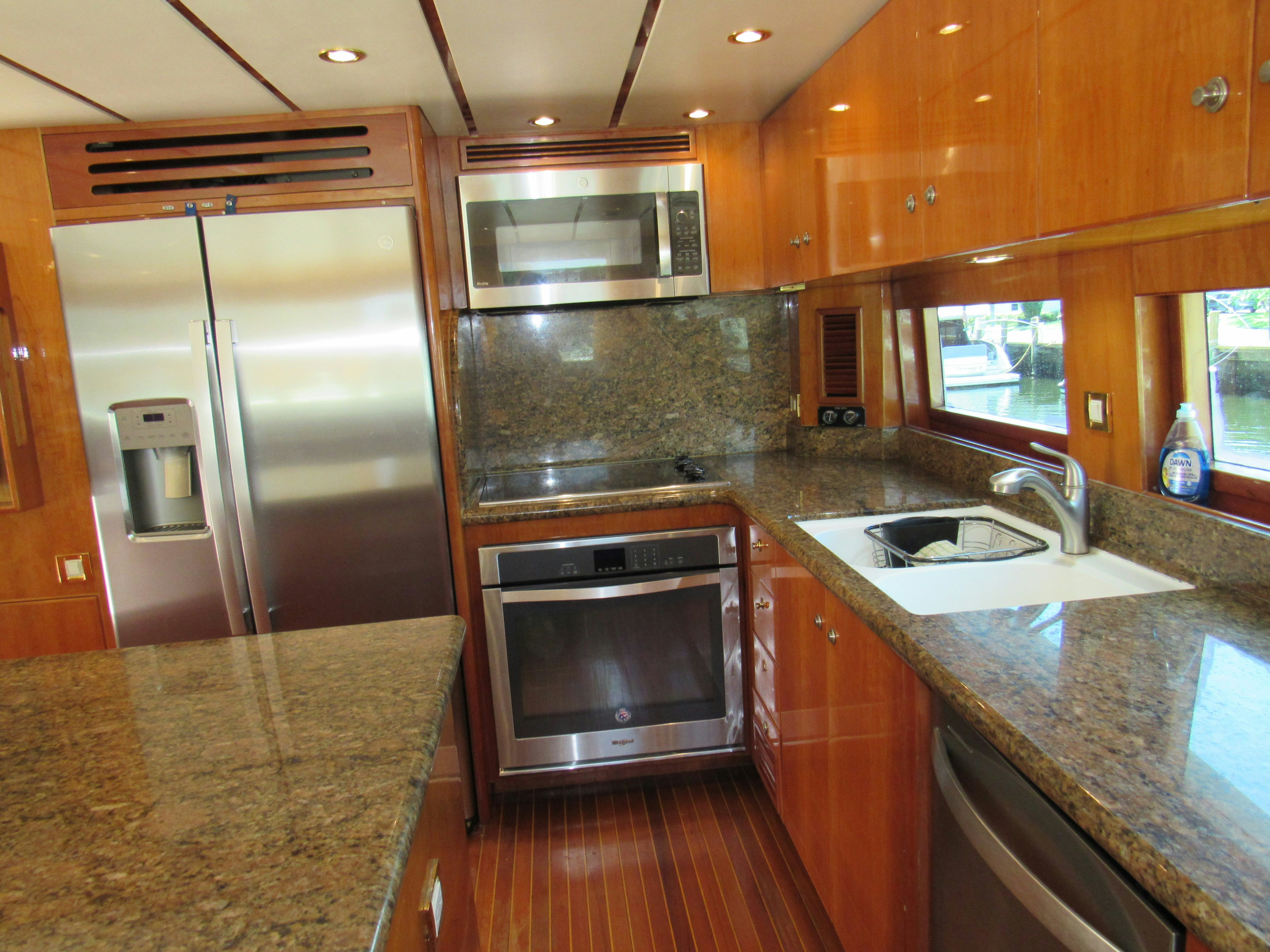 a kitchen with stainless steel appliances aboard SANCTUARY Yacht for Sale