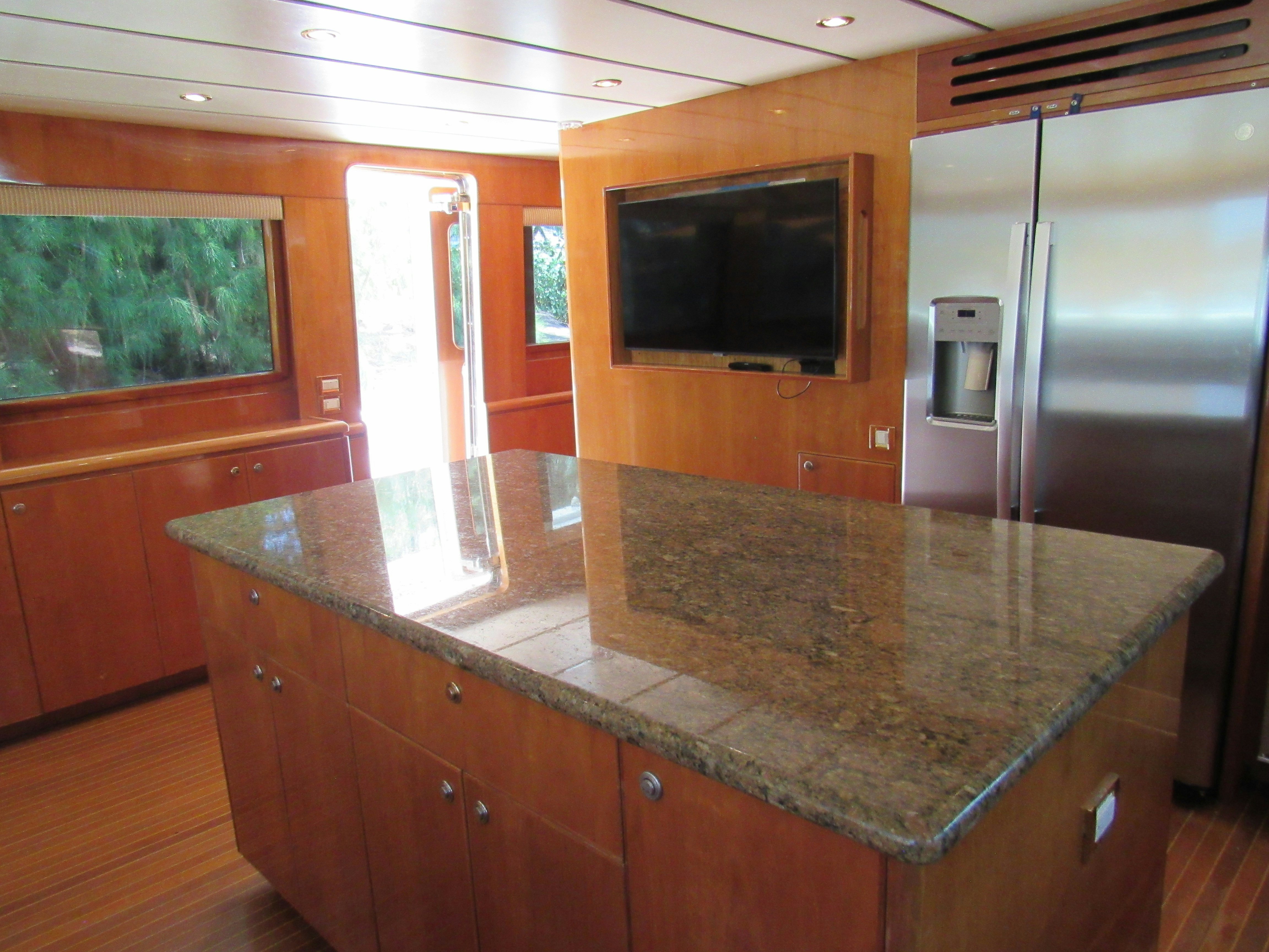 a kitchen with a large island aboard SANCTUARY Yacht for Sale