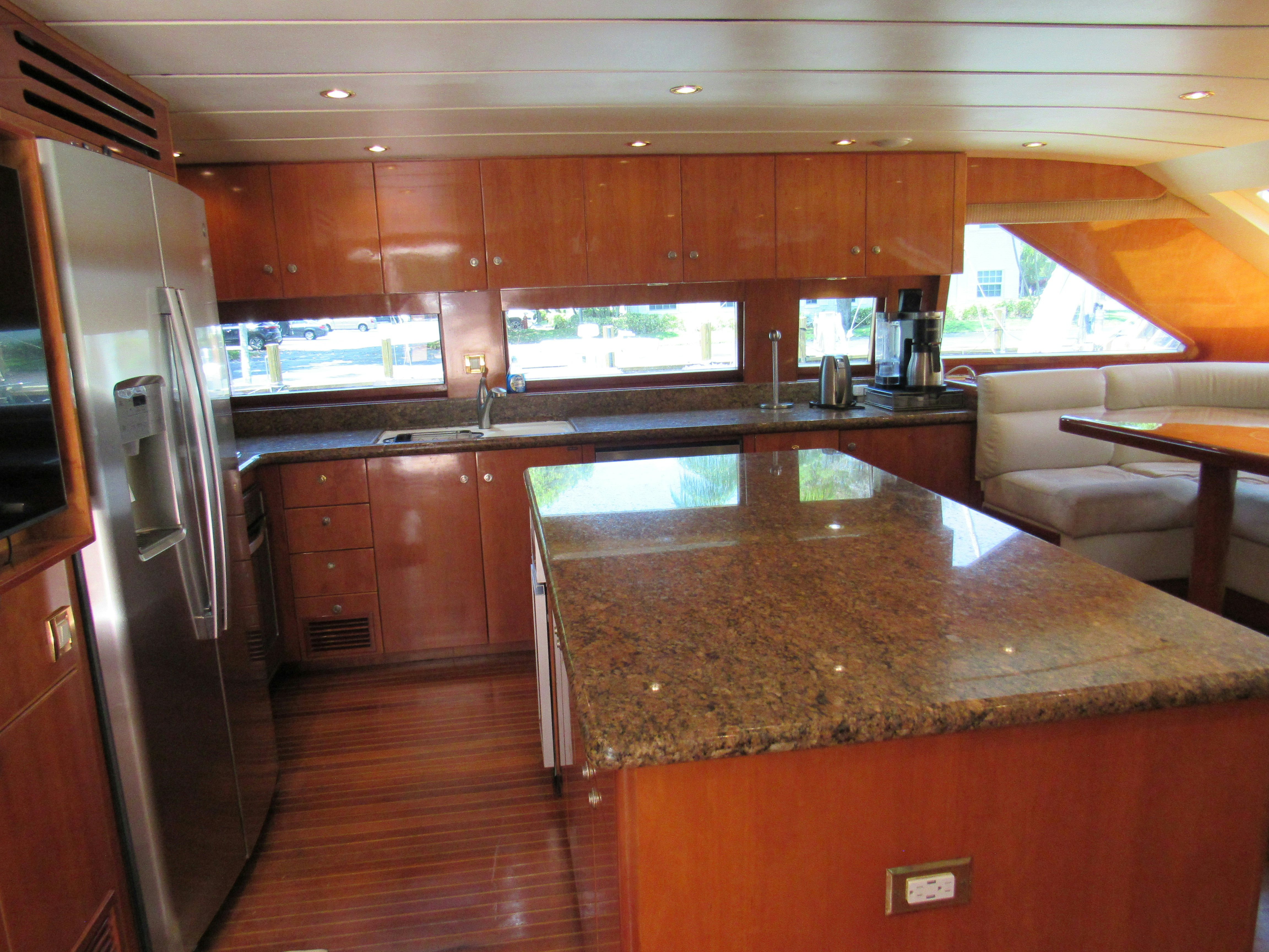 a kitchen with a large island aboard SANCTUARY Yacht for Sale