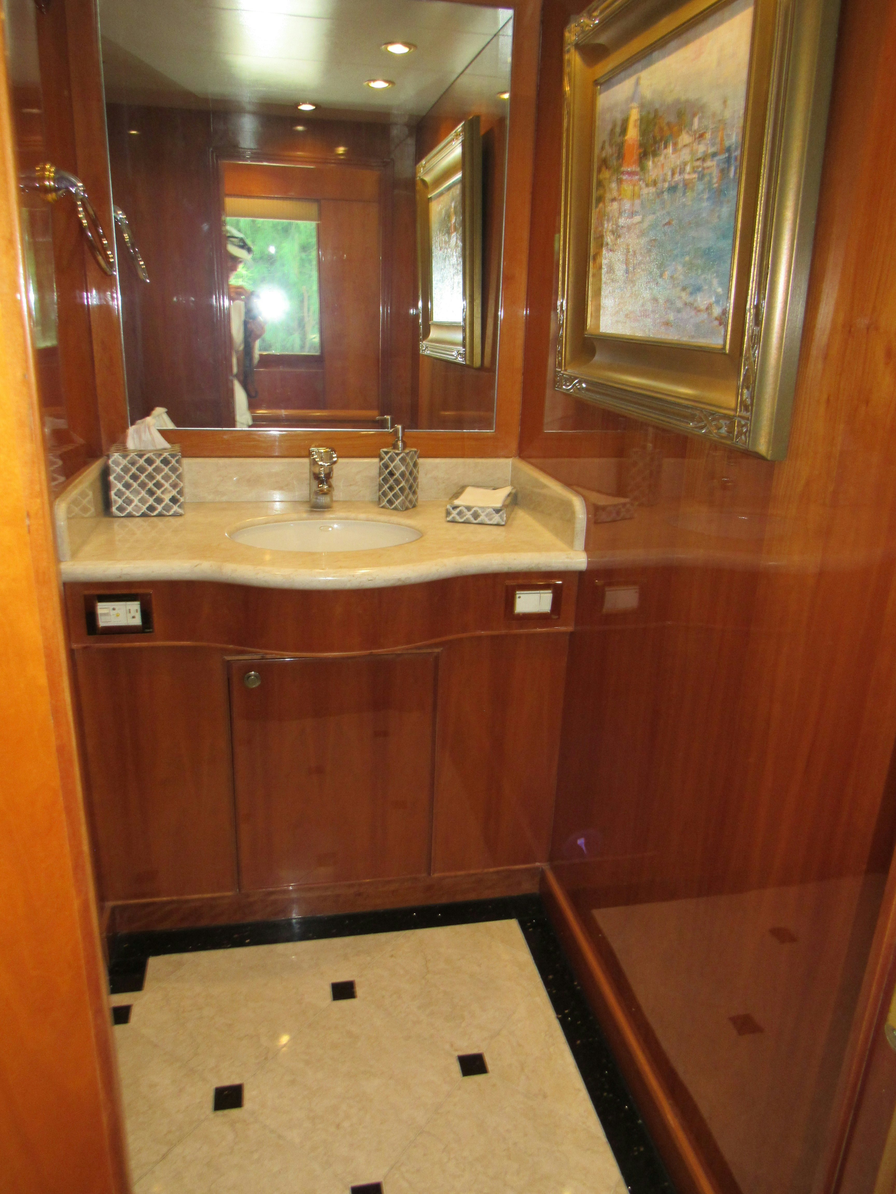 a large wooden closet aboard SANCTUARY Yacht for Sale
