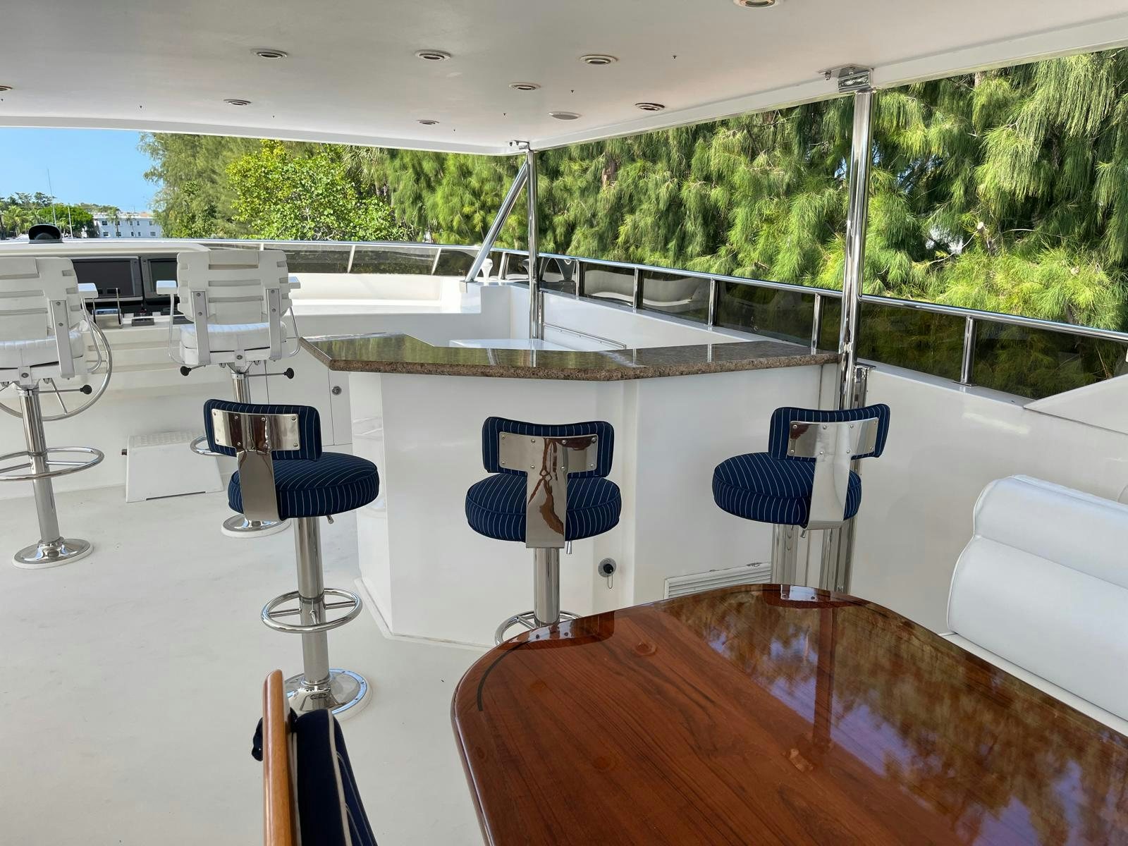 a room with chairs and tables aboard SANCTUARY Yacht for Sale