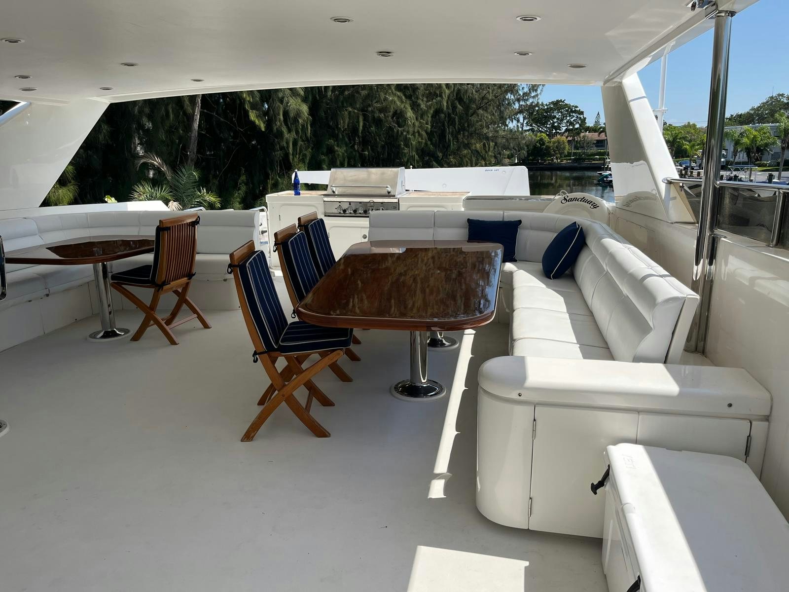 a room with a table and chairs aboard SANCTUARY Yacht for Sale