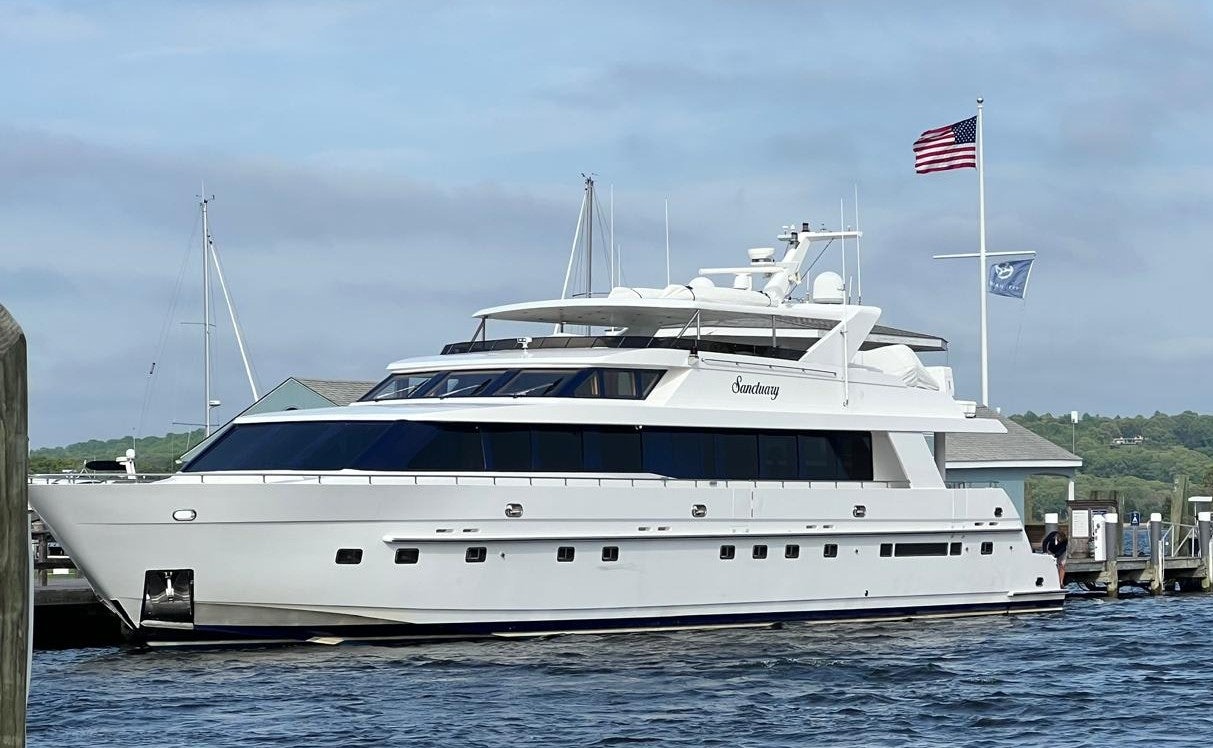 a large white boat aboard SANCTUARY Yacht for Sale