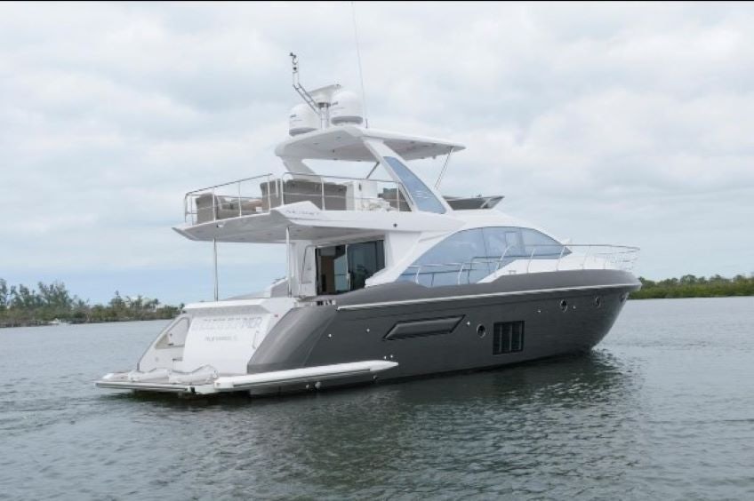 a white boat on the water aboard ENDLESS SUMMER Yacht for Sale