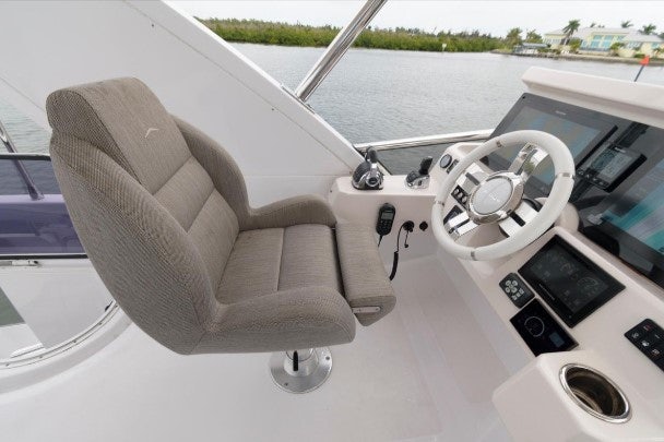 a white car with a steering wheel aboard ENDLESS SUMMER Yacht for Sale