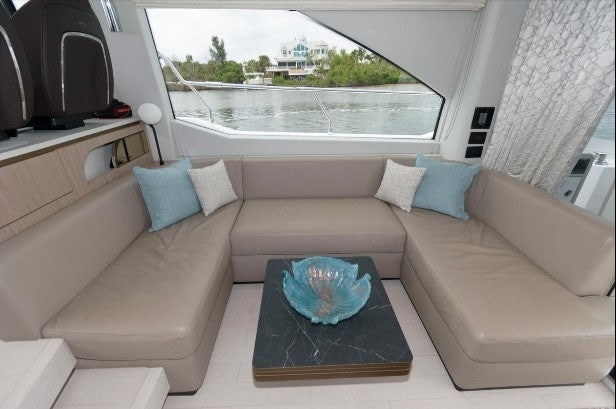 a couch and a television in a room aboard ENDLESS SUMMER Yacht for Sale