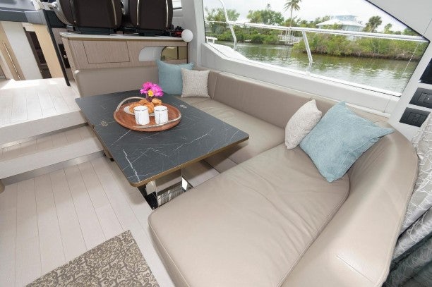 a couch and a table in a room aboard ENDLESS SUMMER Yacht for Sale