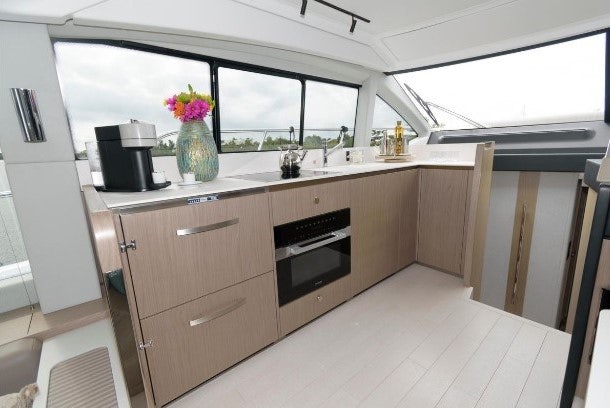a kitchen with a large window aboard ENDLESS SUMMER Yacht for Sale
