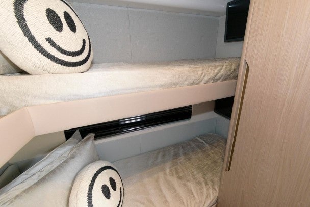 a bed with a pillow and a pillow on it aboard ENDLESS SUMMER Yacht for Sale