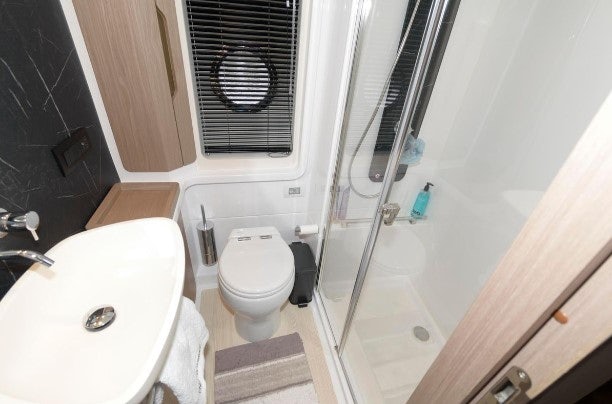 a bathroom with a shower unit and toilet aboard ENDLESS SUMMER Yacht for Sale