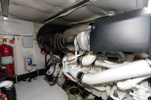 a car with a large engine aboard ENDLESS SUMMER Yacht for Sale