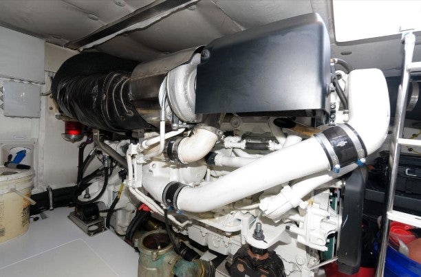 a car with a large engine aboard ENDLESS SUMMER Yacht for Sale