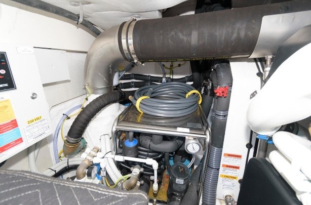 a car engine with a few parts aboard ENDLESS SUMMER Yacht for Sale