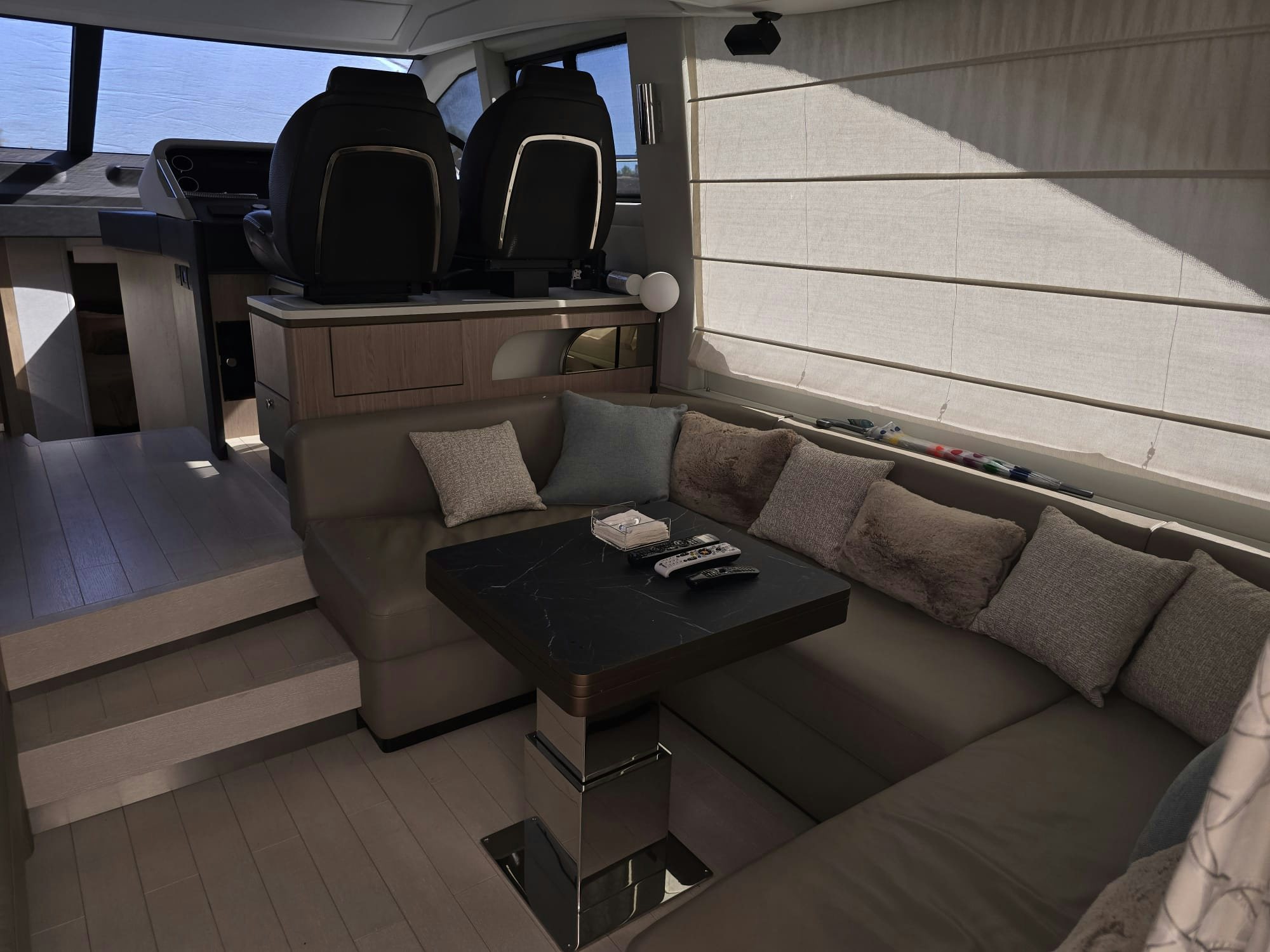 a couch with a coffee table aboard ENDLESS SUMMER Yacht for Sale