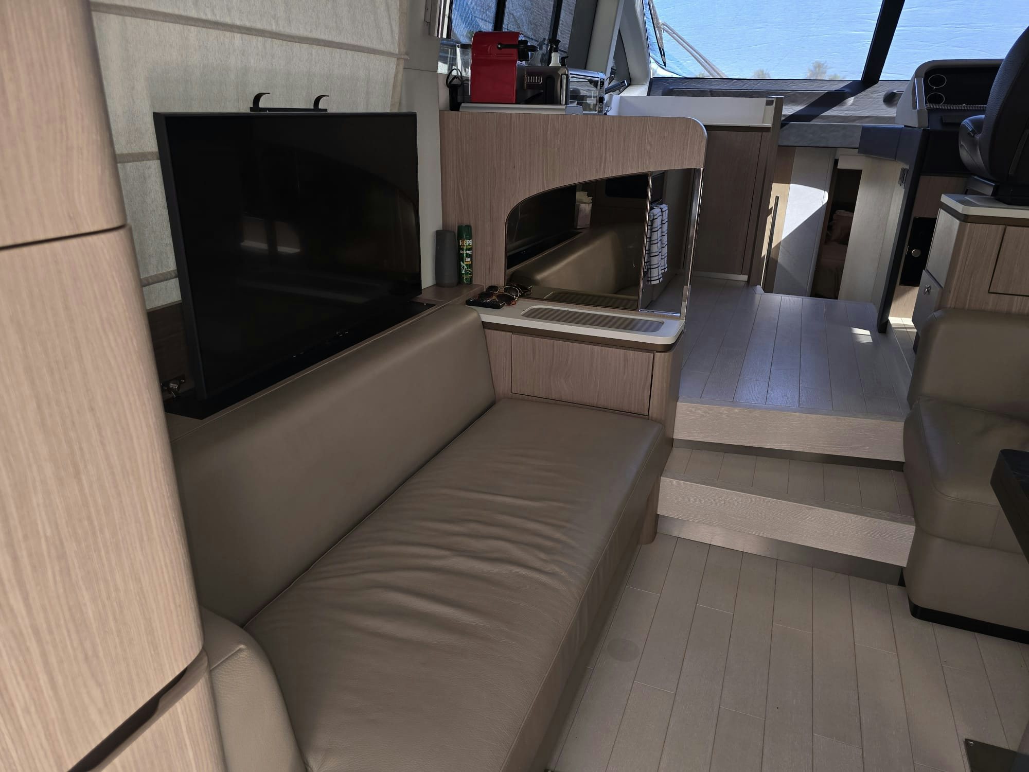 a couch and a television in a room aboard ENDLESS SUMMER Yacht for Sale