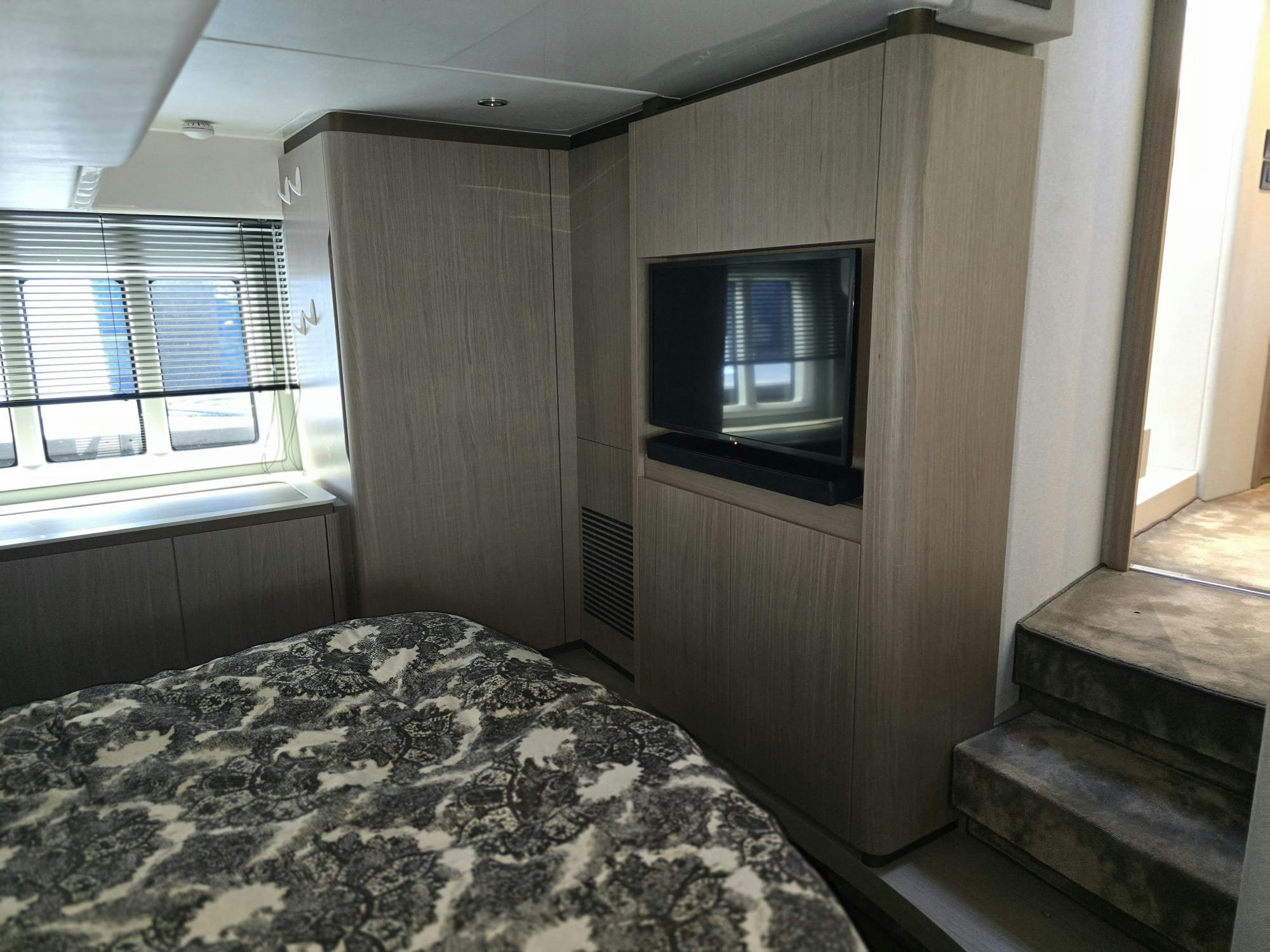 a bed in a room aboard ENDLESS SUMMER Yacht for Sale