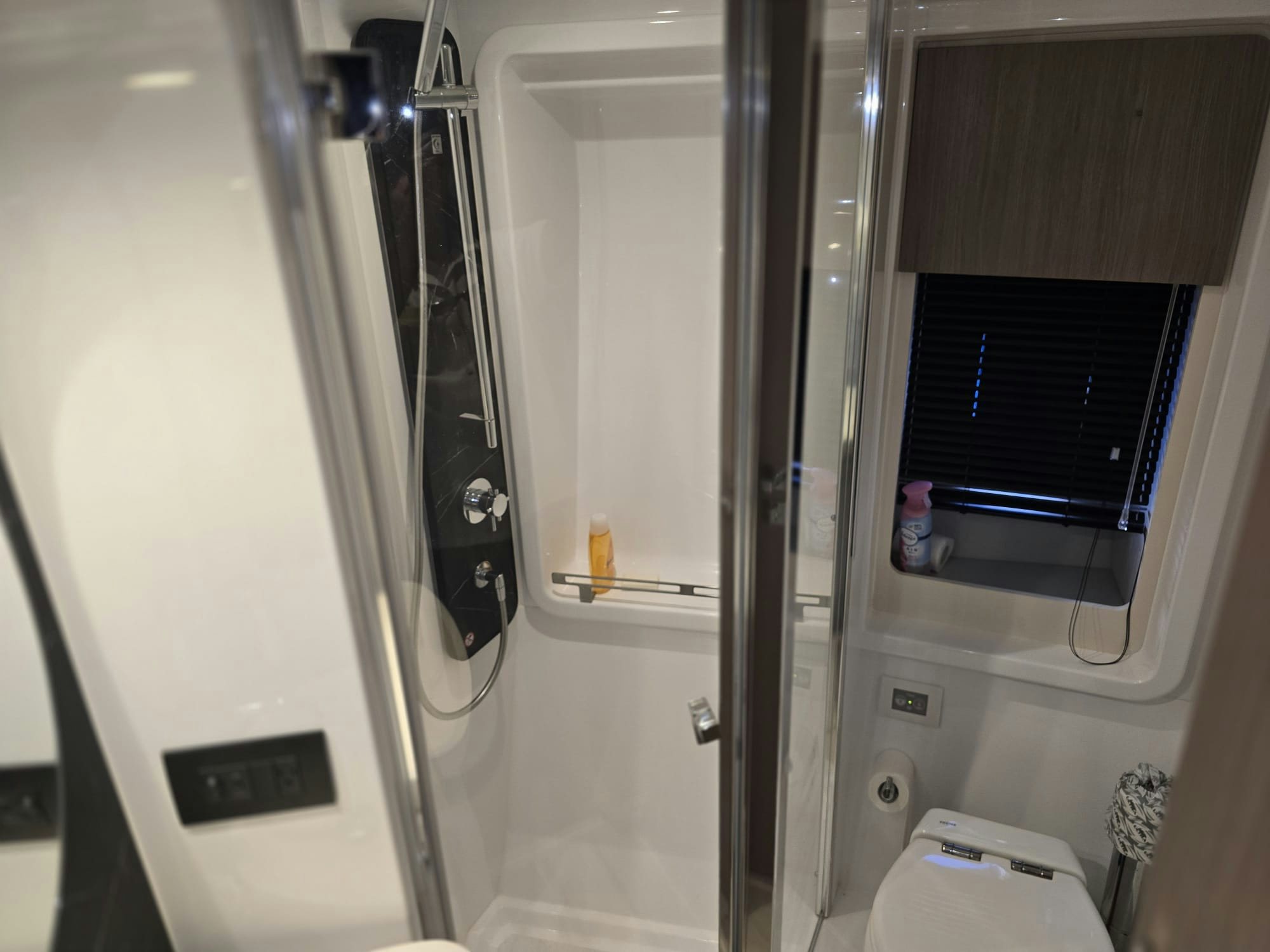 a shower unit with a black handle aboard ENDLESS SUMMER Yacht for Sale