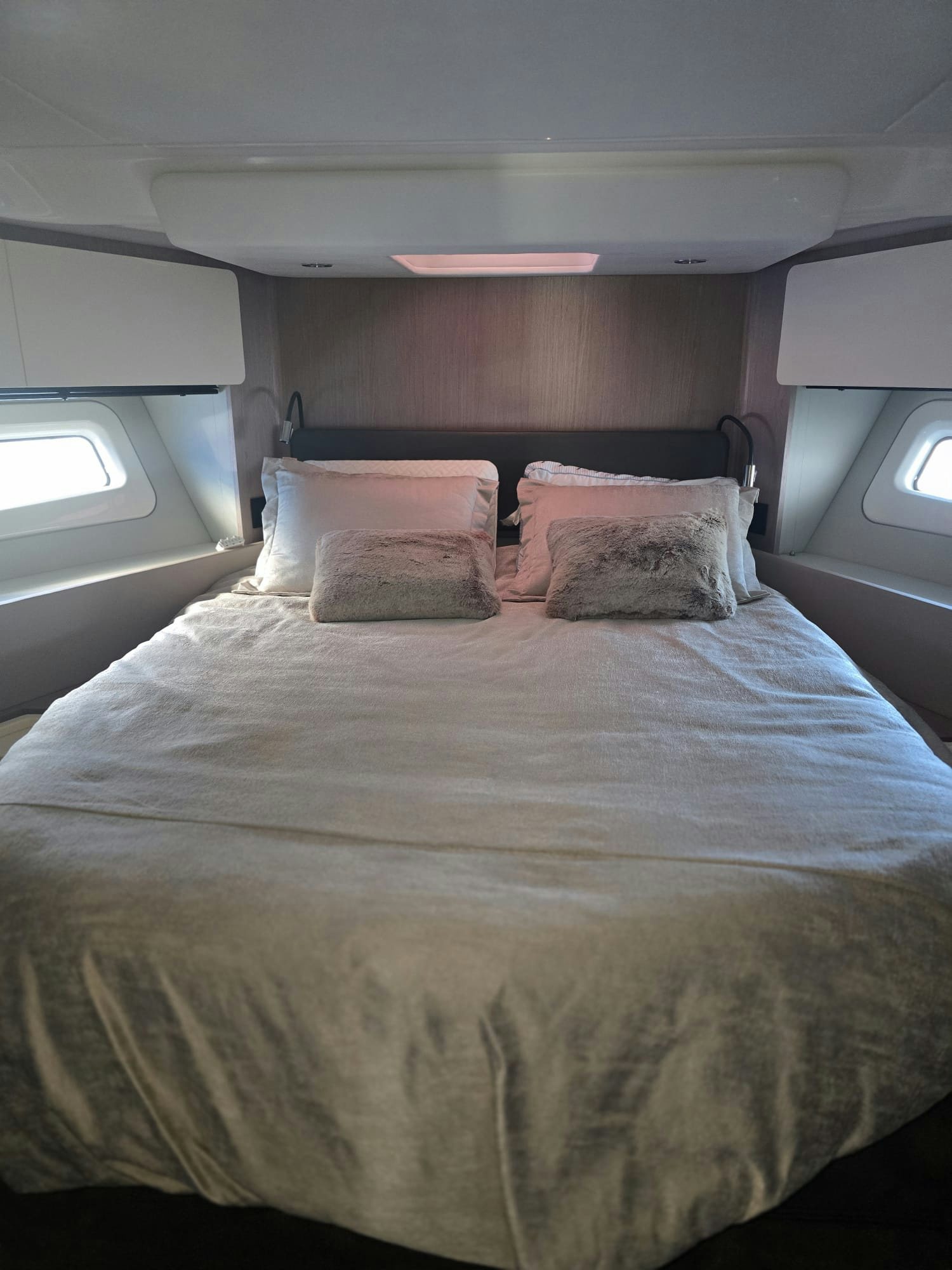 a bed with pillows aboard ENDLESS SUMMER Yacht for Sale