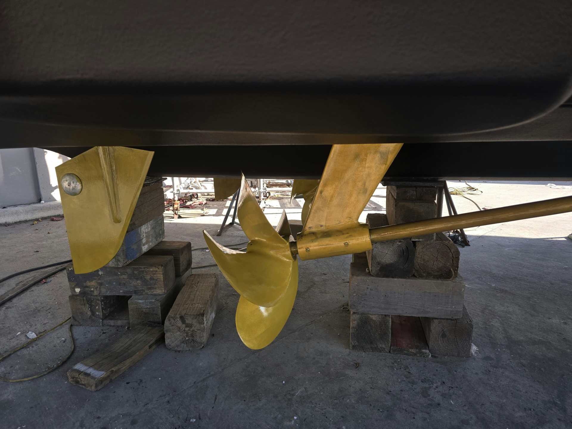 a yellow plastic toy on a wooden structure aboard ENDLESS SUMMER Yacht for Sale