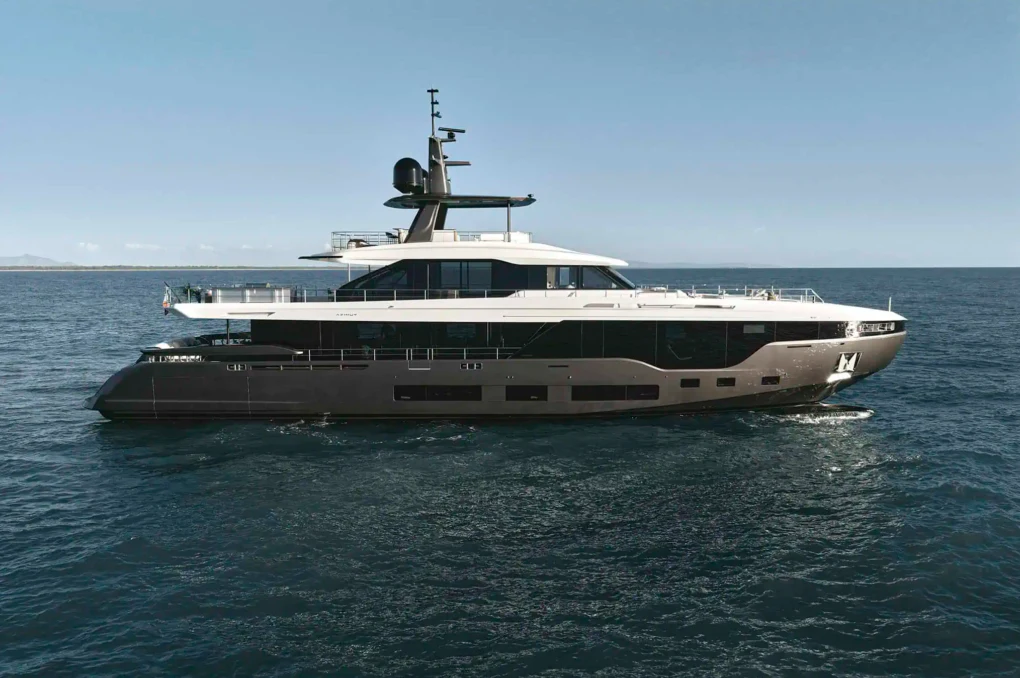 a large white boat in the water aboard ILMA Yacht for Charter