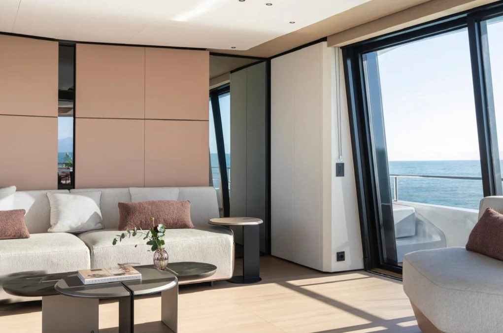 a living room with a couch and a table aboard ILMA Yacht for Charter