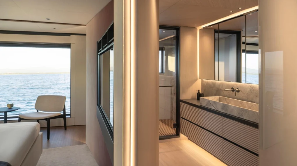 a bathroom with a large window aboard ILMA Yacht for Charter