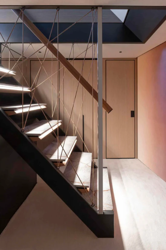 a staircase with a glass ceiling aboard ILMA Yacht for Charter