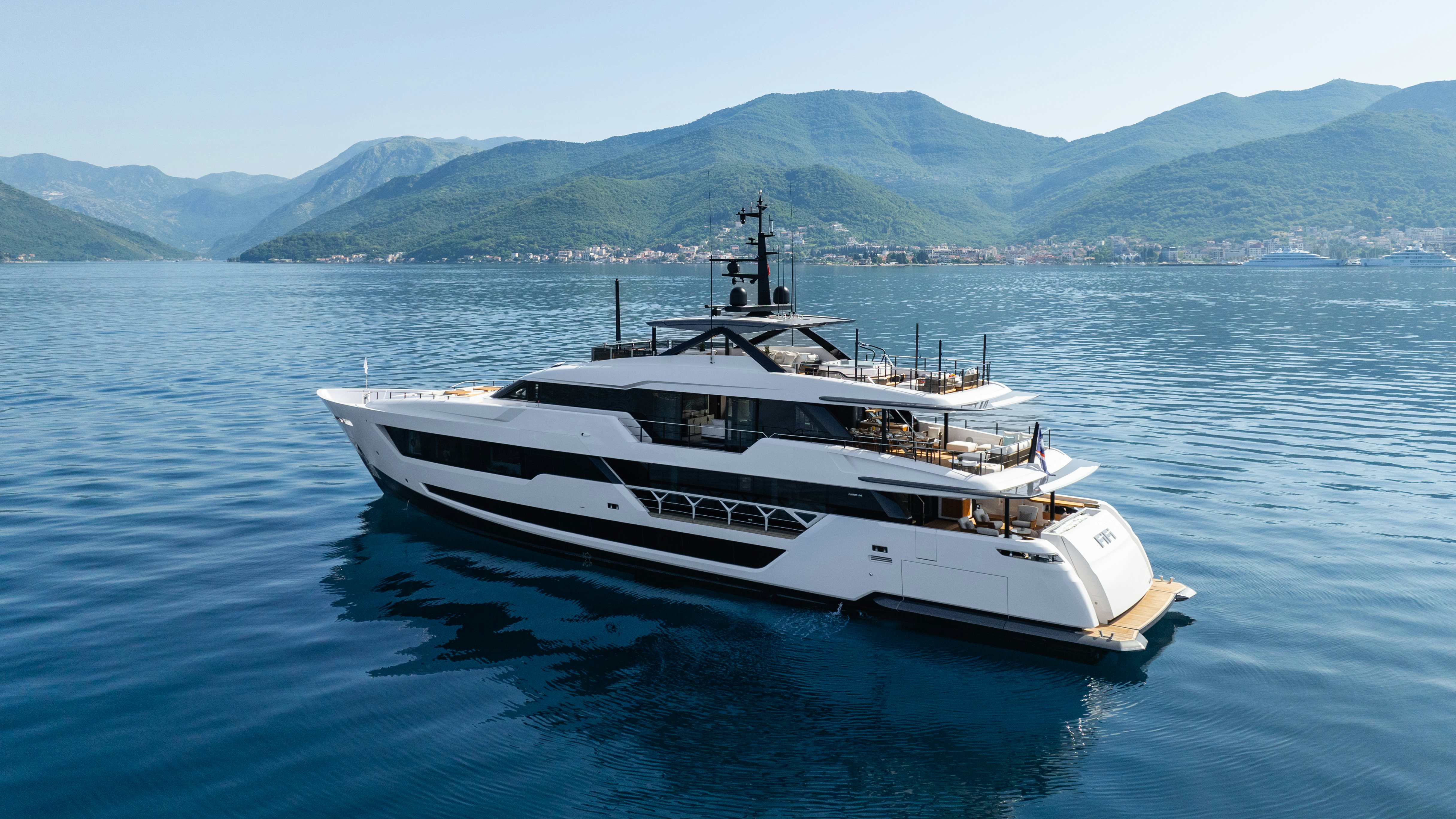 a white yacht in the water aboard FIFI Yacht for Charter