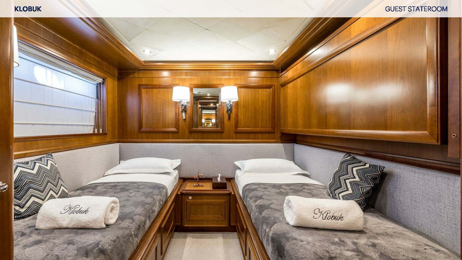 a room with two beds aboard KLOBUK Yacht for Charter