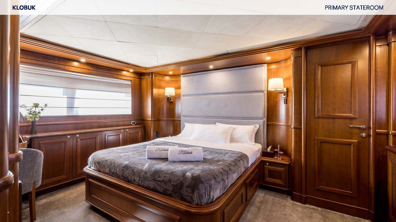 a bed in a room aboard KLOBUK Yacht for Charter