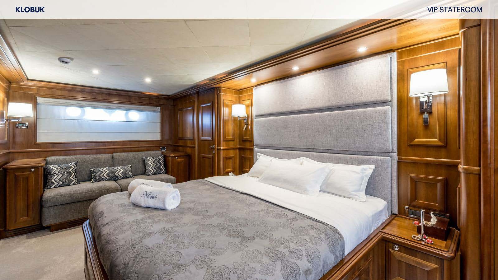 a bed in a room aboard KLOBUK Yacht for Charter