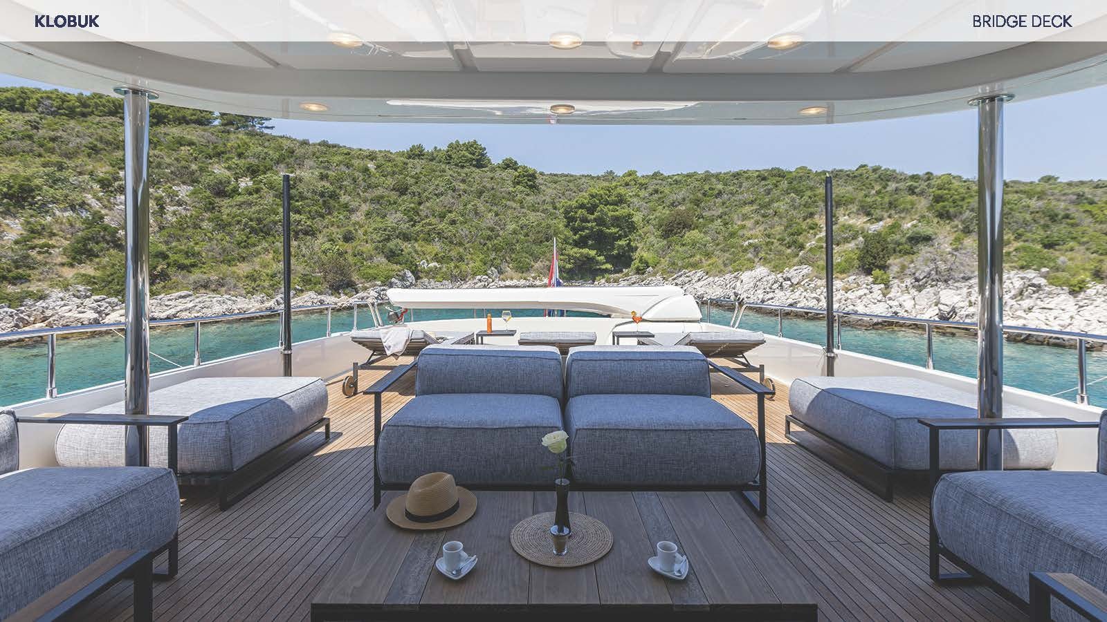 a large patio with a pool aboard KLOBUK Yacht for Charter