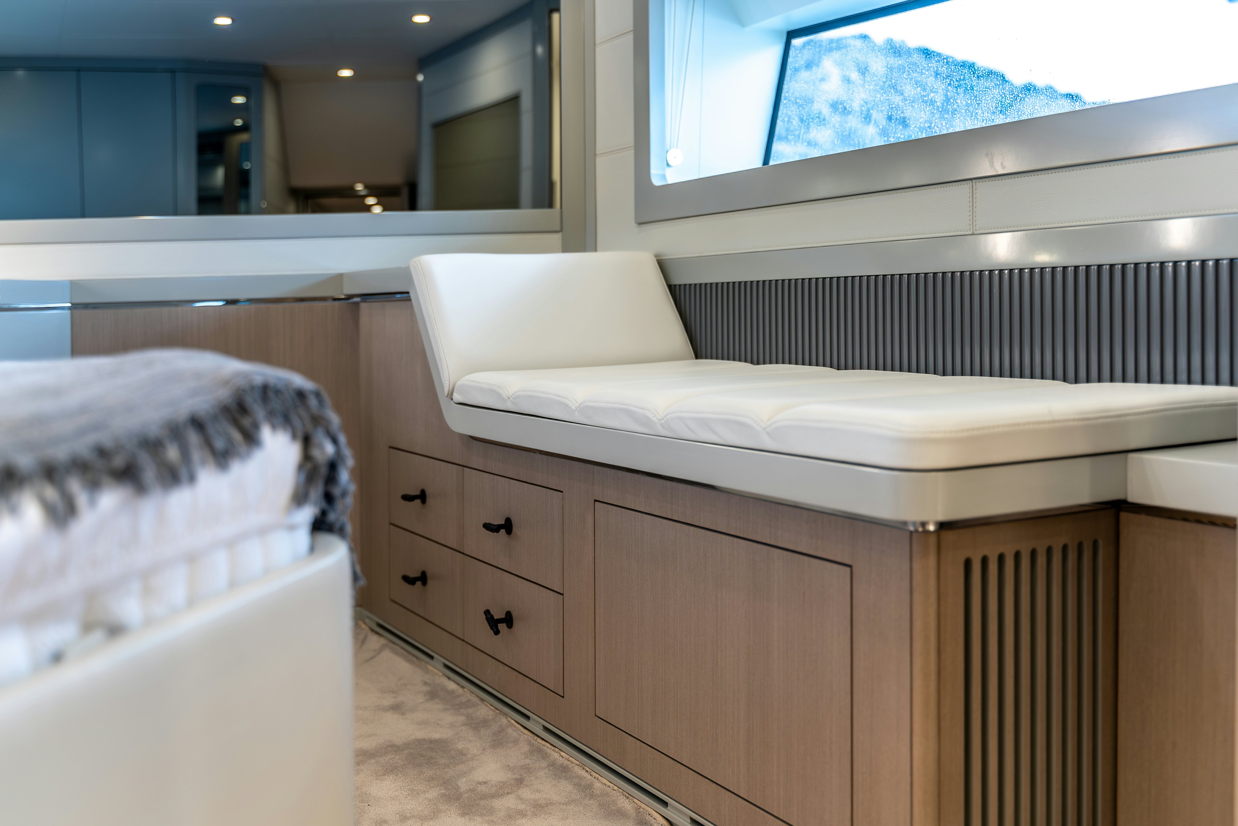 a room with a bed and a television aboard GALENE IV Yacht for Sale