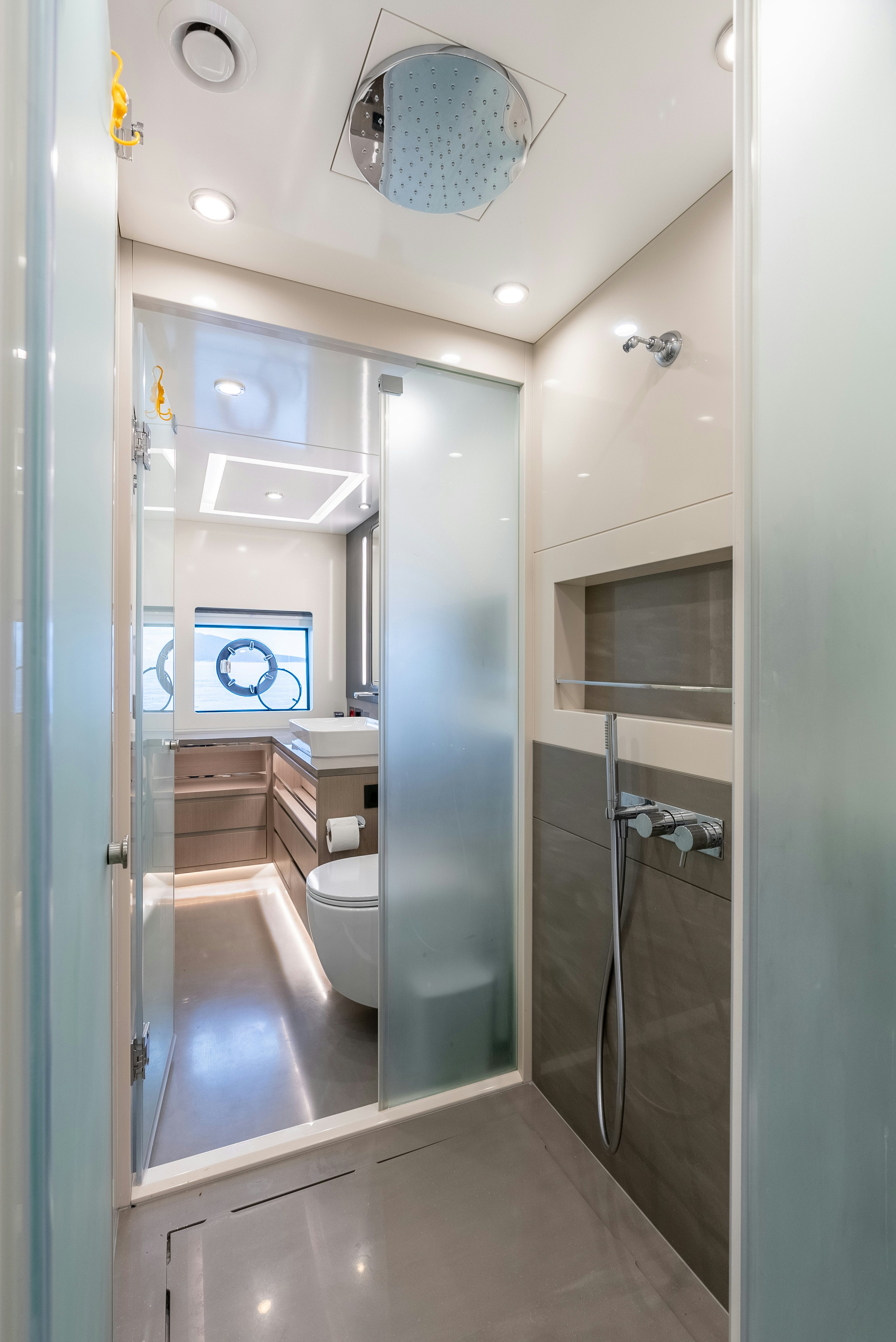 a bathroom with a shower unit and sink aboard GALENE IV Yacht for Sale