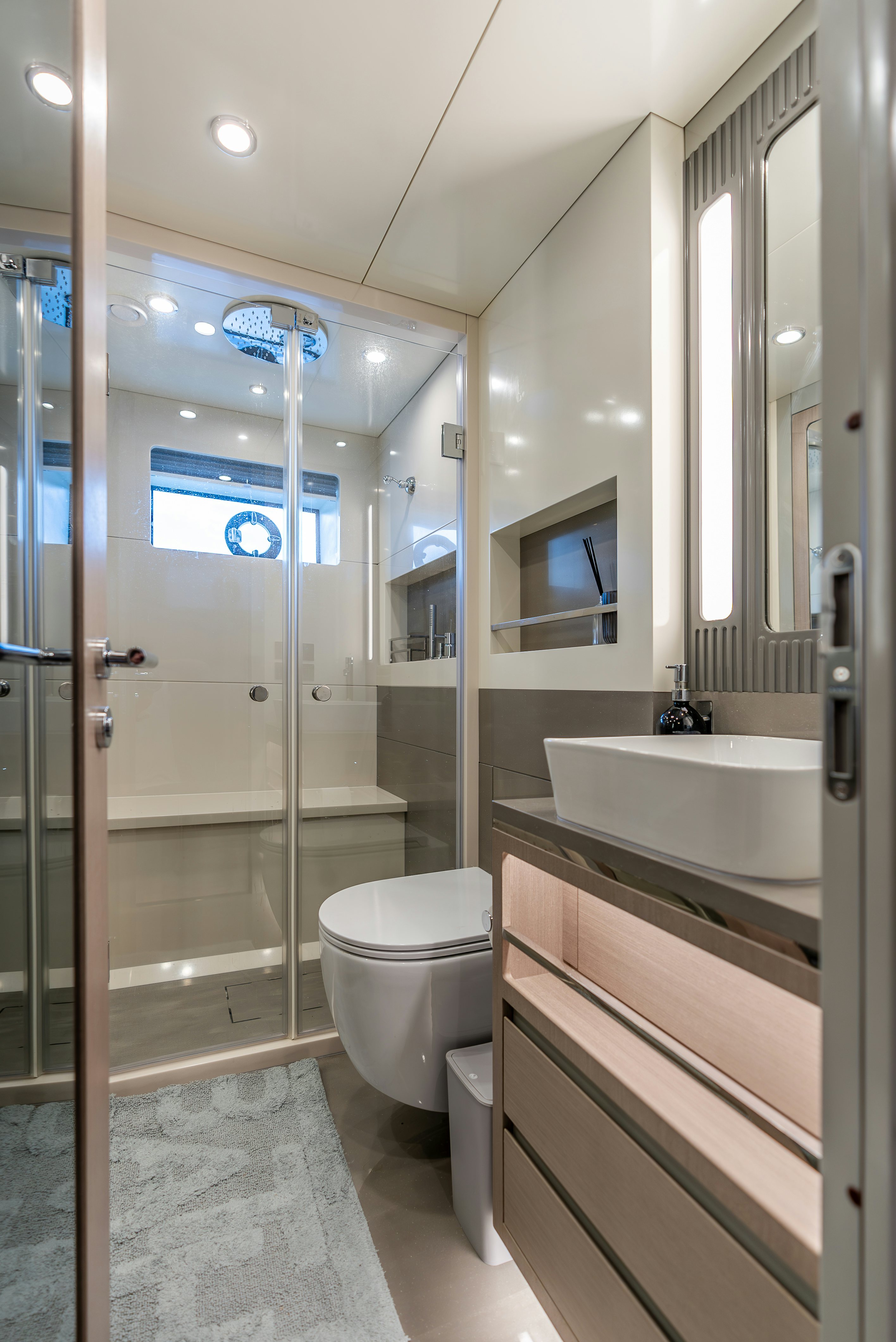 a bathroom with a glass shower aboard GALENE IV Yacht for Sale