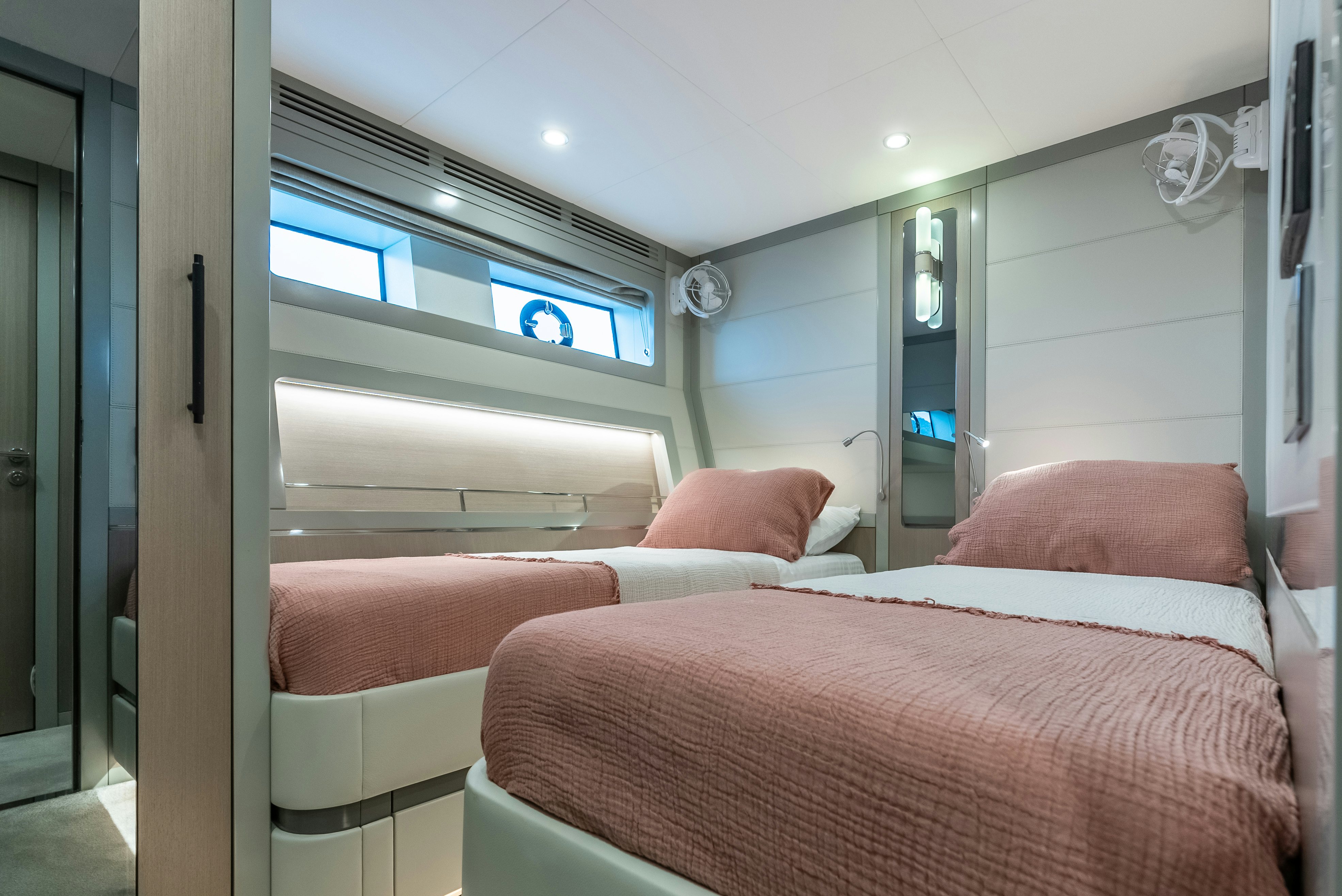 a room with a bed and a tv on the wall aboard GALENE IV Yacht for Sale