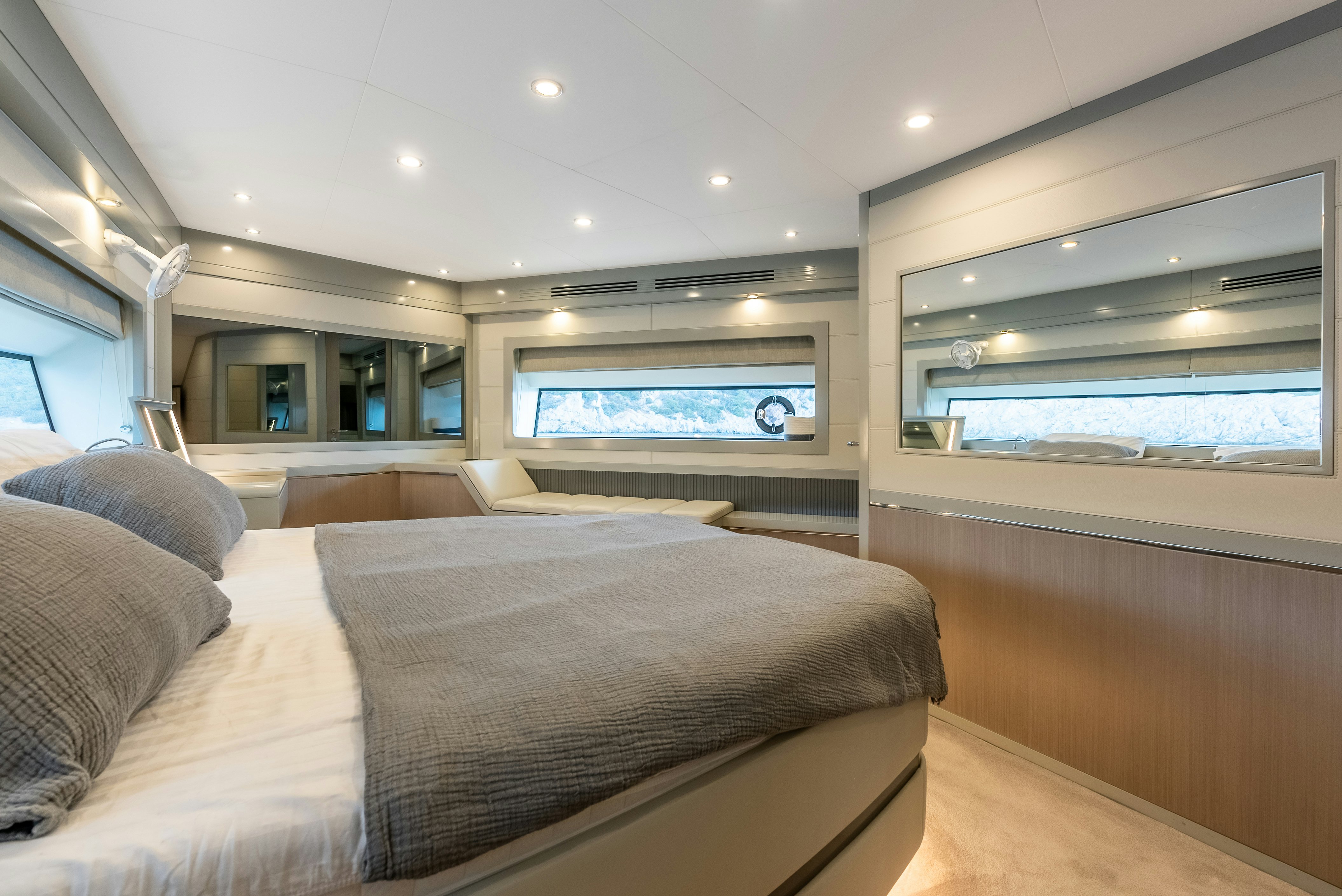 a room with a bed and a window aboard GALENE IV Yacht for Sale