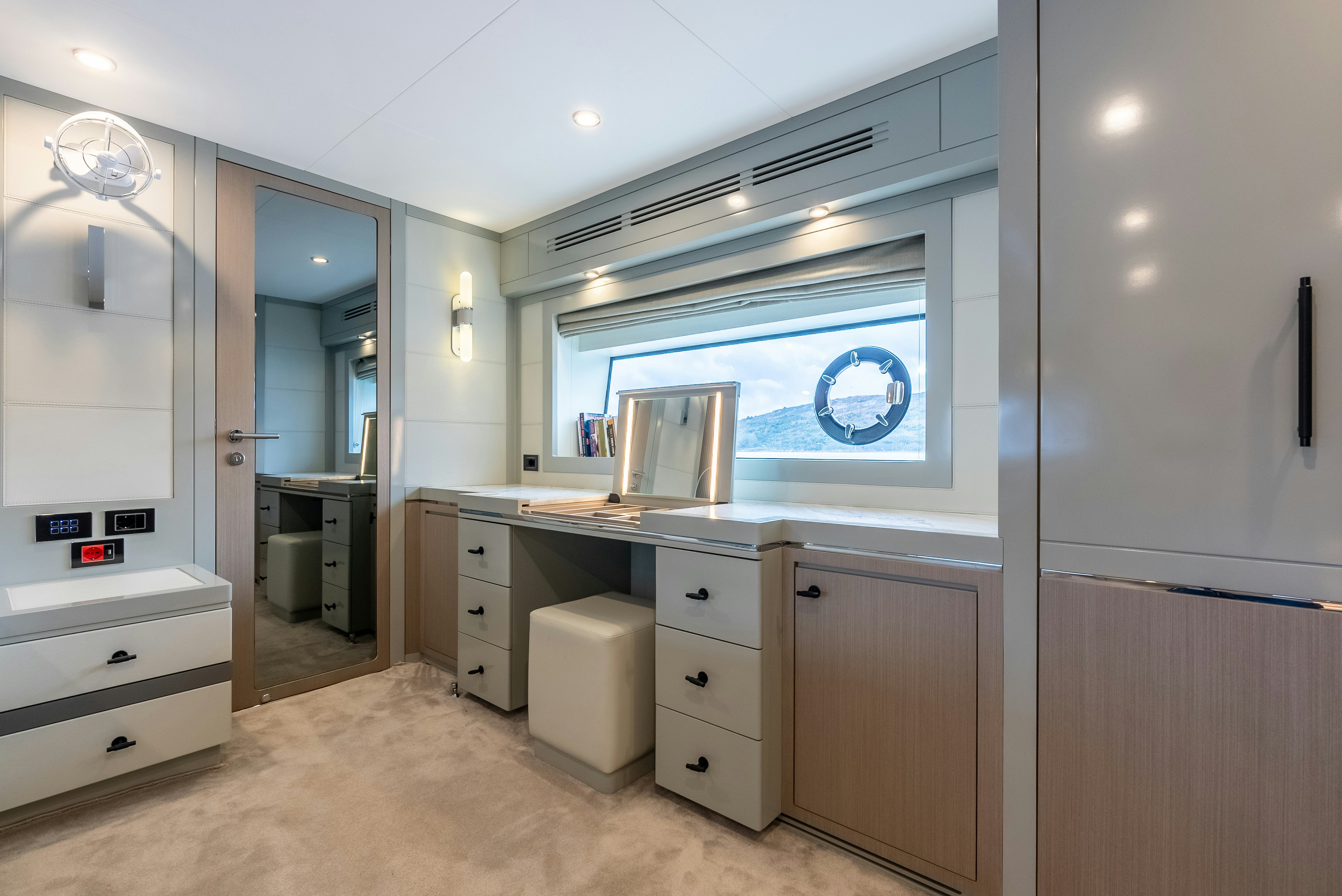 a kitchen with a large window aboard GALENE IV Yacht for Sale