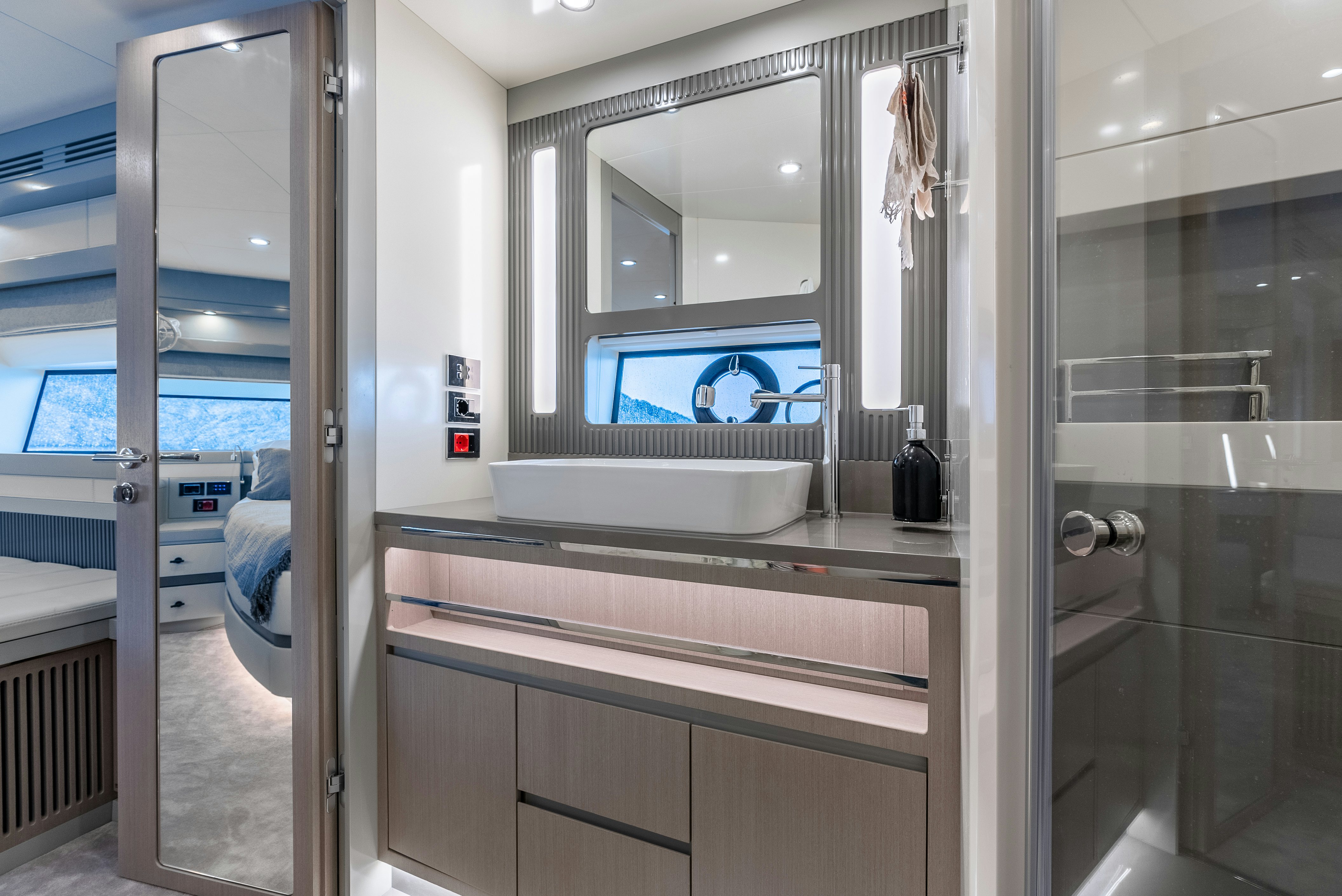 a tv on a glass wall aboard GALENE IV Yacht for Sale