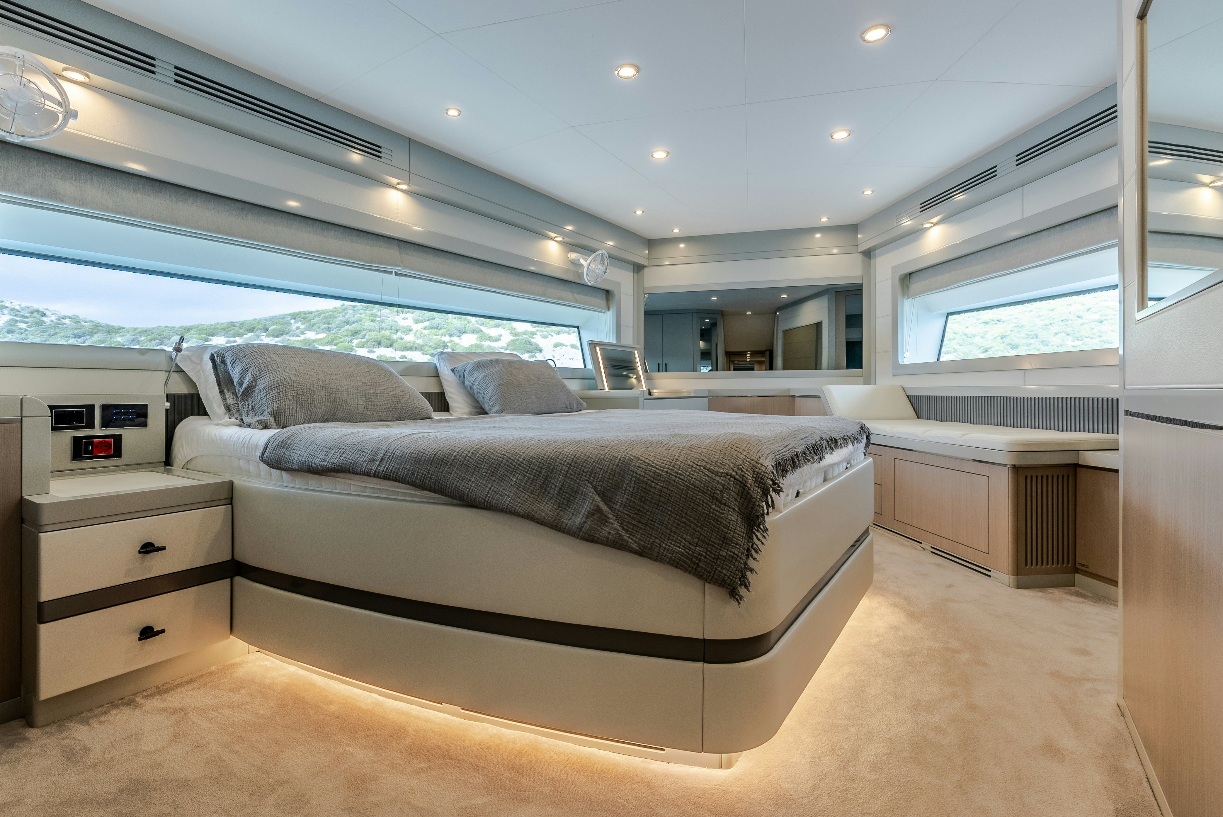 a large bedroom with a large bed aboard GALENE IV Yacht for Sale